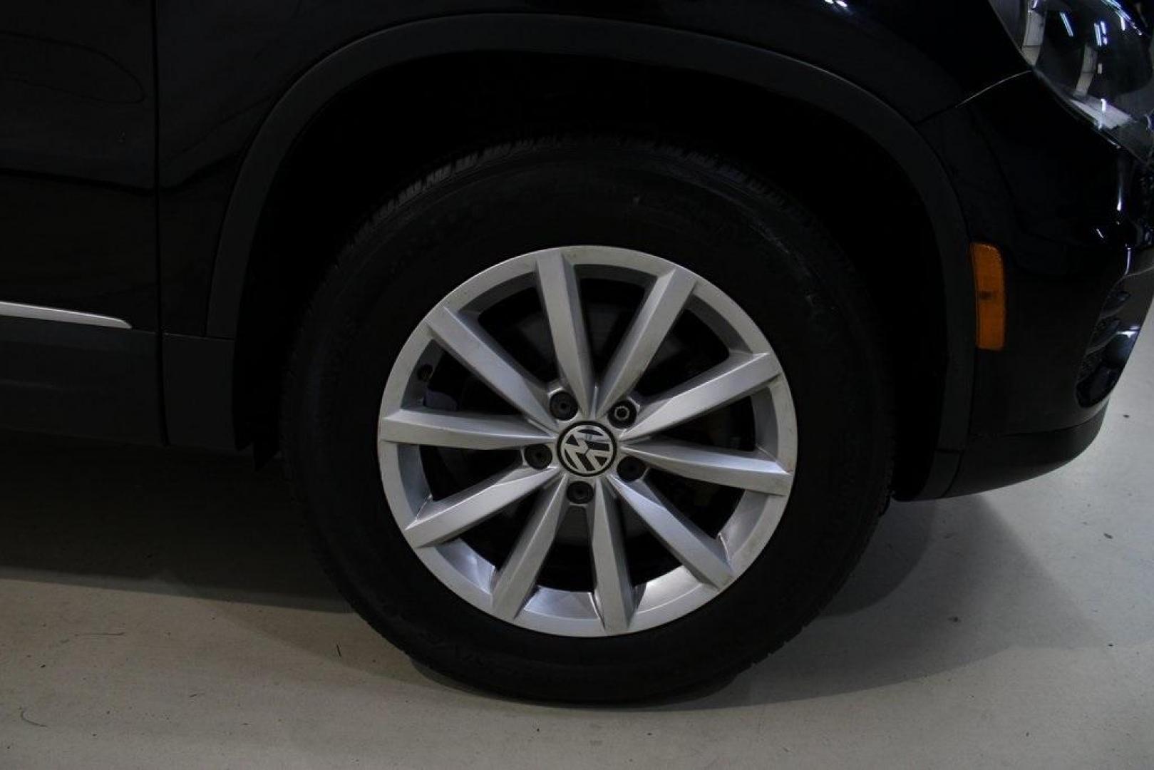 2017 Deep Black /Charcoal Black Volkswagen Tiguan 2.0T Wolfsburg Edition (WVGRV7AX4HK) with an 2.0L TSI DOHC engine, Automatic transmission, located at 15300 Midway Rd., Addison, TX, 75001, (972) 702-0011, 32.958321, -96.838074 - 2017 Volkswagen Touareg V6 Wolfsburg Edition<br>Now Available at Midway Auto Group Addison, Texas<br><br>Premium, powerful, and well-equipped, the 2017 Volkswagen Touareg Wolfsburg Edition delivers luxury SUV refinement with German-engineered performance. With a smooth V6 engine, a richly appointed - Photo#11
