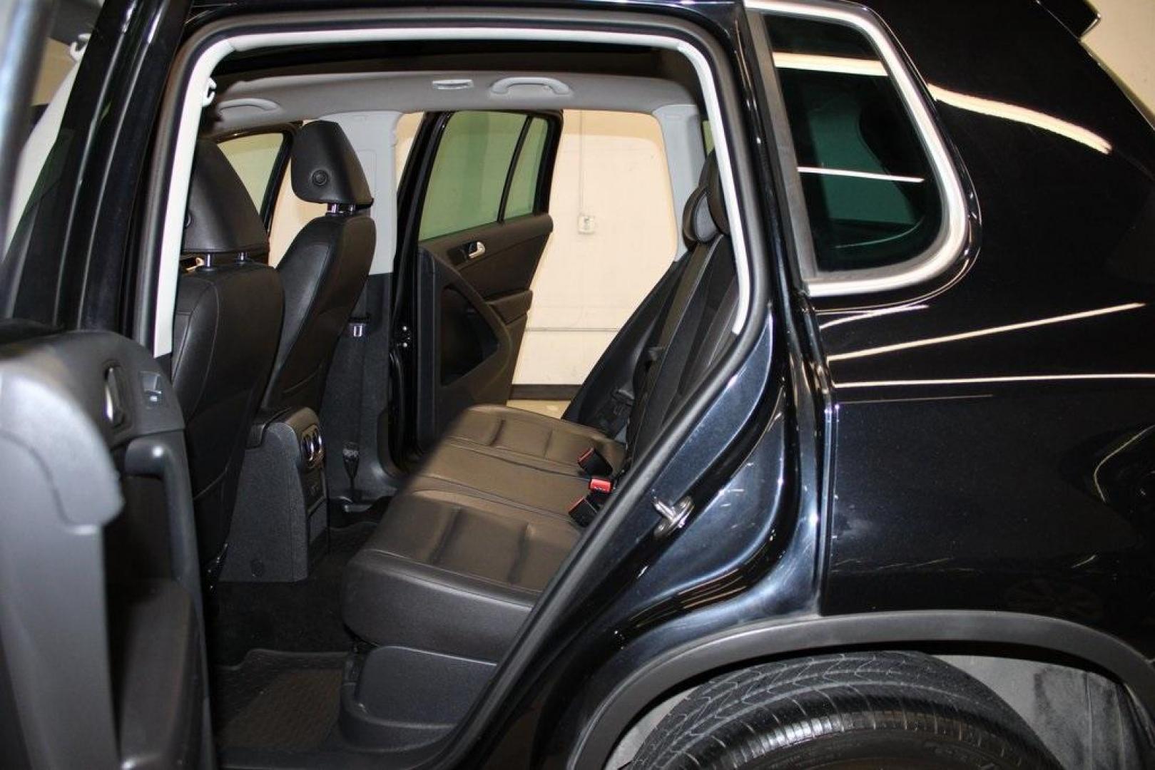 2017 Deep Black /Charcoal Black Volkswagen Tiguan 2.0T Wolfsburg Edition (WVGRV7AX4HK) with an 2.0L TSI DOHC engine, Automatic transmission, located at 15300 Midway Rd., Addison, TX, 75001, (972) 702-0011, 32.958321, -96.838074 - 2017 Volkswagen Touareg V6 Wolfsburg Edition<br>Now Available at Midway Auto Group Addison, Texas<br><br>Premium, powerful, and well-equipped, the 2017 Volkswagen Touareg Wolfsburg Edition delivers luxury SUV refinement with German-engineered performance. With a smooth V6 engine, a richly appointed - Photo#15