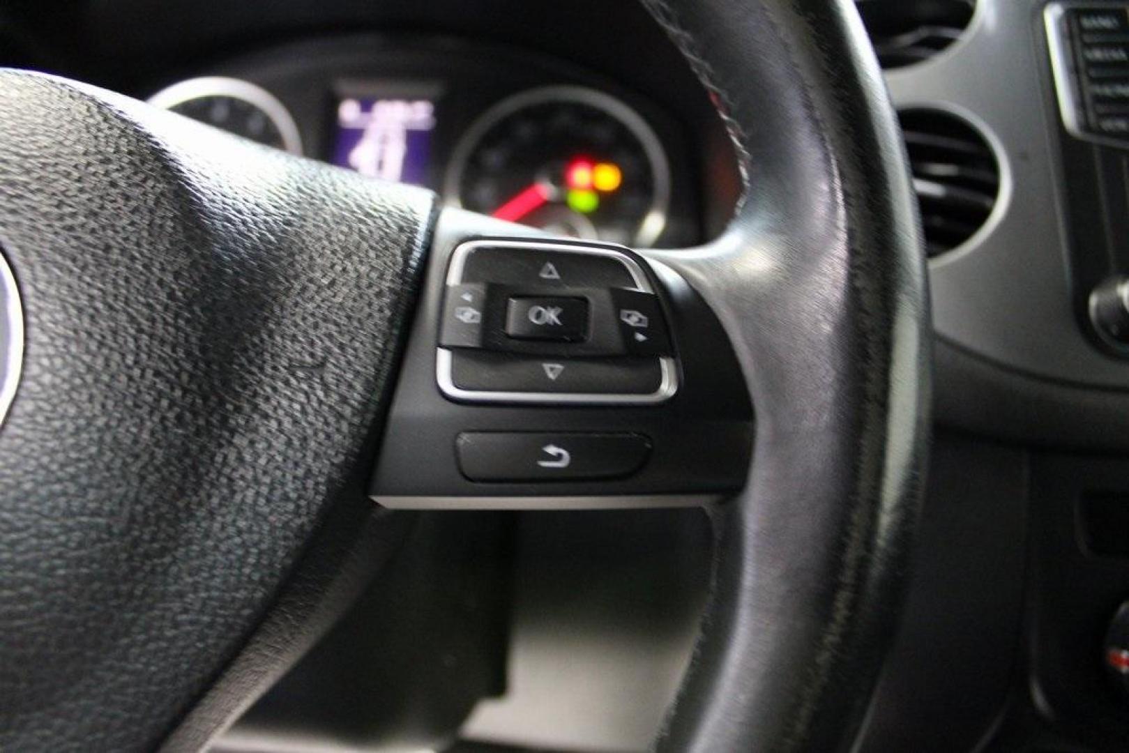 2017 Deep Black /Charcoal Black Volkswagen Tiguan 2.0T Wolfsburg Edition (WVGRV7AX4HK) with an 2.0L TSI DOHC engine, Automatic transmission, located at 15300 Midway Rd., Addison, TX, 75001, (972) 702-0011, 32.958321, -96.838074 - 2017 Volkswagen Touareg V6 Wolfsburg Edition<br>Now Available at Midway Auto Group Addison, Texas<br><br>Premium, powerful, and well-equipped, the 2017 Volkswagen Touareg Wolfsburg Edition delivers luxury SUV refinement with German-engineered performance. With a smooth V6 engine, a richly appointed - Photo#21