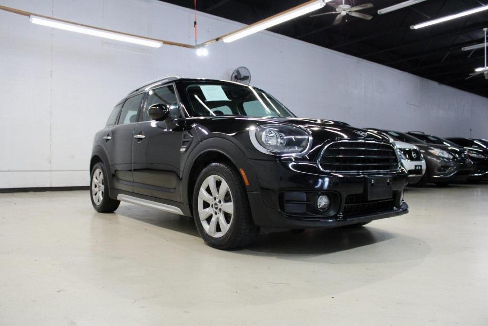 2019 Midnight Black Metallic /Carbon Black MINI Cooper Countryman Iconic (WMZYS7C52K3) with an 1.5L I-3 engine, Automatic transmission, located at 15300 Midway Rd., Addison, TX, 75001, (972) 702-0011, 32.958321, -96.838074 - 2019 MINI Countryman Cooper S ALL4<br>Now Available at Midway Auto Group Addison, Texas<br><br>Stylish, sporty, and surprisingly spacious, the 2019 MINI Countryman Cooper S ALL4 combines the unmistakable MINI design with true SUV capability. With its turbocharged performance, premium interior, and - Photo#1