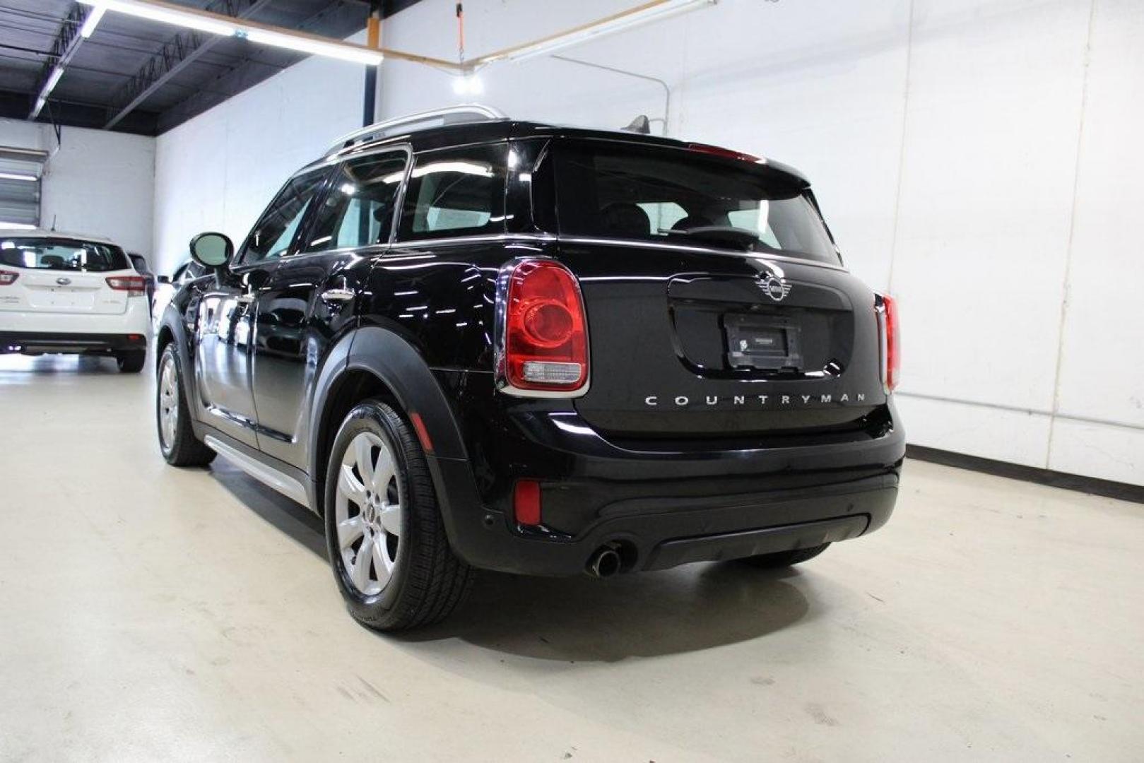 2019 Midnight Black Metallic /Carbon Black MINI Cooper Countryman Iconic (WMZYS7C52K3) with an 1.5L I-3 engine, Automatic transmission, located at 15300 Midway Rd., Addison, TX, 75001, (972) 702-0011, 32.958321, -96.838074 - 2019 MINI Countryman Cooper S ALL4<br>Now Available at Midway Auto Group Addison, Texas<br><br>Stylish, sporty, and surprisingly spacious, the 2019 MINI Countryman Cooper S ALL4 combines the unmistakable MINI design with true SUV capability. With its turbocharged performance, premium interior, and - Photo#3