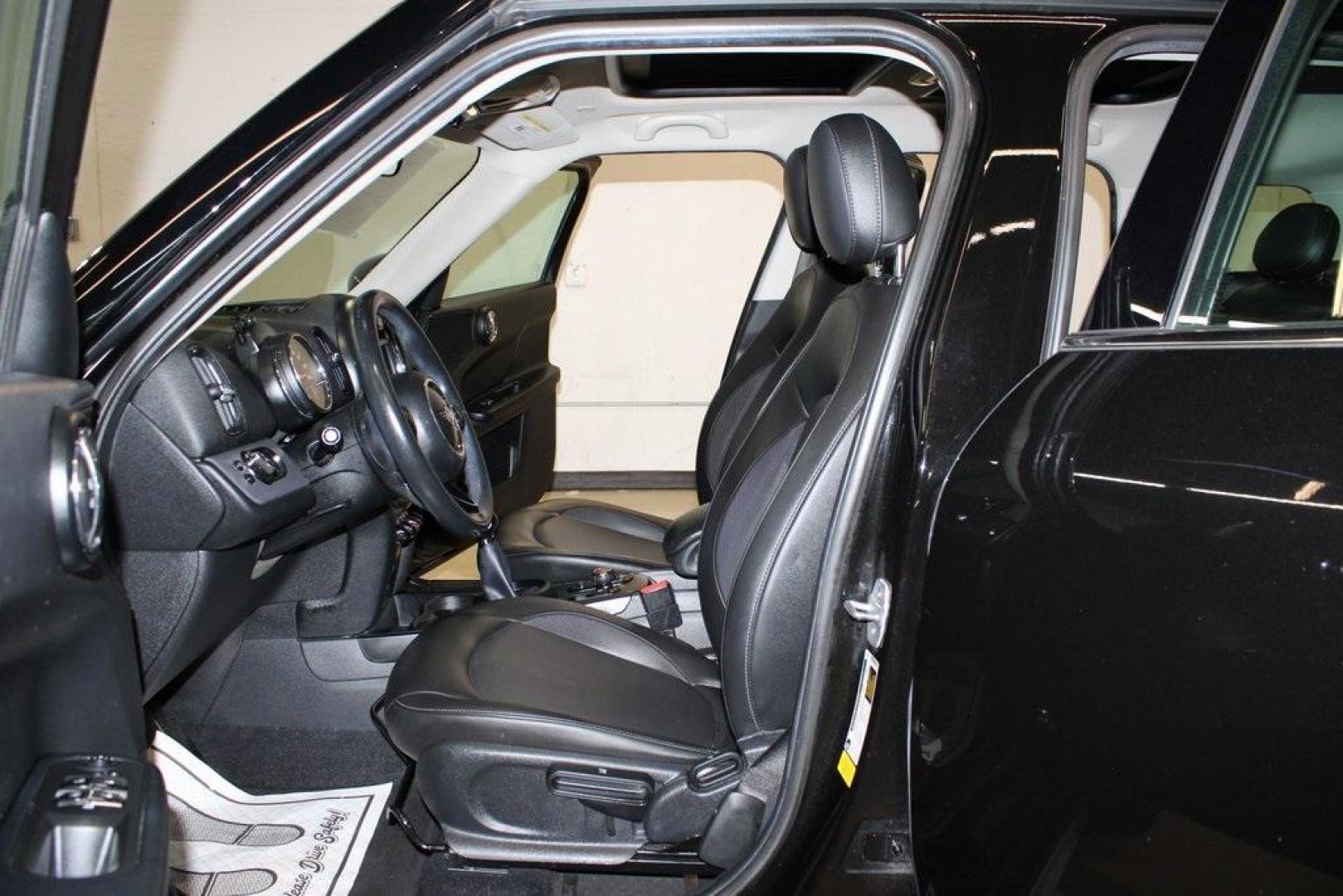 2019 Midnight Black Metallic /Carbon Black MINI Cooper Countryman Iconic (WMZYS7C52K3) with an 1.5L I-3 engine, Automatic transmission, located at 15300 Midway Rd., Addison, TX, 75001, (972) 702-0011, 32.958321, -96.838074 - 2019 MINI Countryman Cooper S ALL4<br>Now Available at Midway Auto Group Addison, Texas<br><br>Stylish, sporty, and surprisingly spacious, the 2019 MINI Countryman Cooper S ALL4 combines the unmistakable MINI design with true SUV capability. With its turbocharged performance, premium interior, and - Photo#14