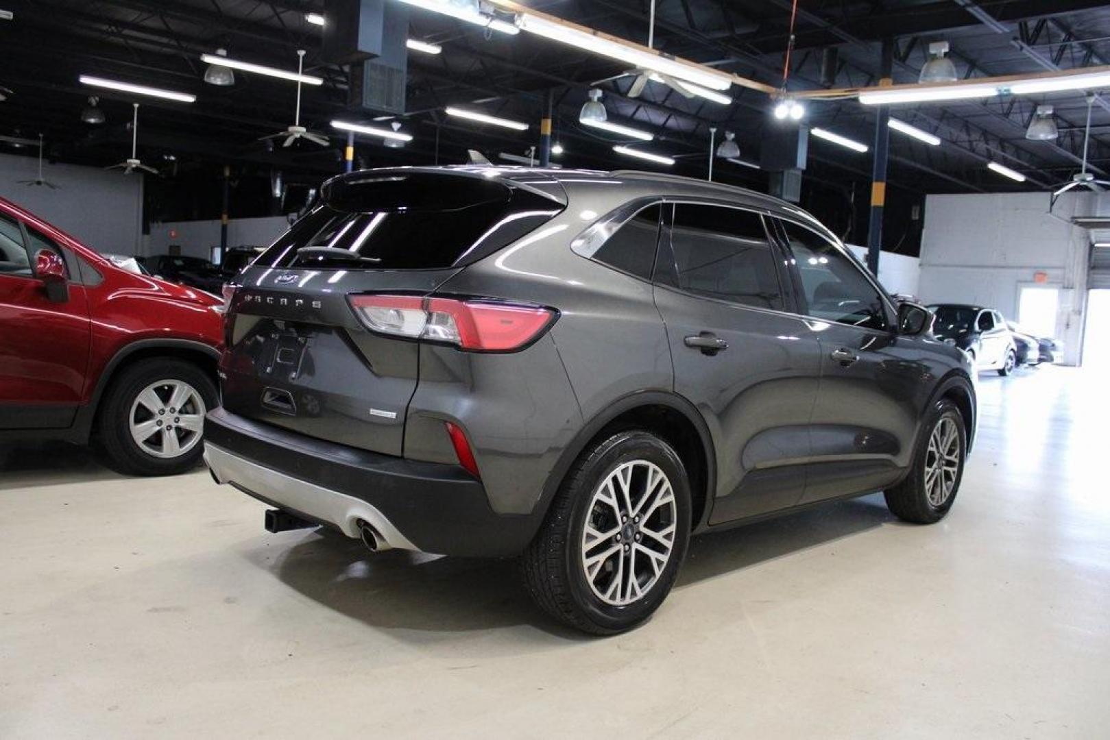 2020 Magnetic /Sandstone Ford Escape SEL (1FMCU0H6XLU) with an 1.5L EcoBoost engine, Automatic transmission, located at 15300 Midway Rd., Addison, TX, 75001, (972) 702-0011, 32.958321, -96.838074 - 2020 Ford Escape SEL<br>Now Available at Midway Auto Group Addison, Texas<br><br>Smart, efficient, and loaded with modern features, the 2020 Ford Escape SEL is a standout compact SUV that blends versatility, technology, and comfort. Whether you're commuting around DFW or heading out for a weekend t - Photo#2