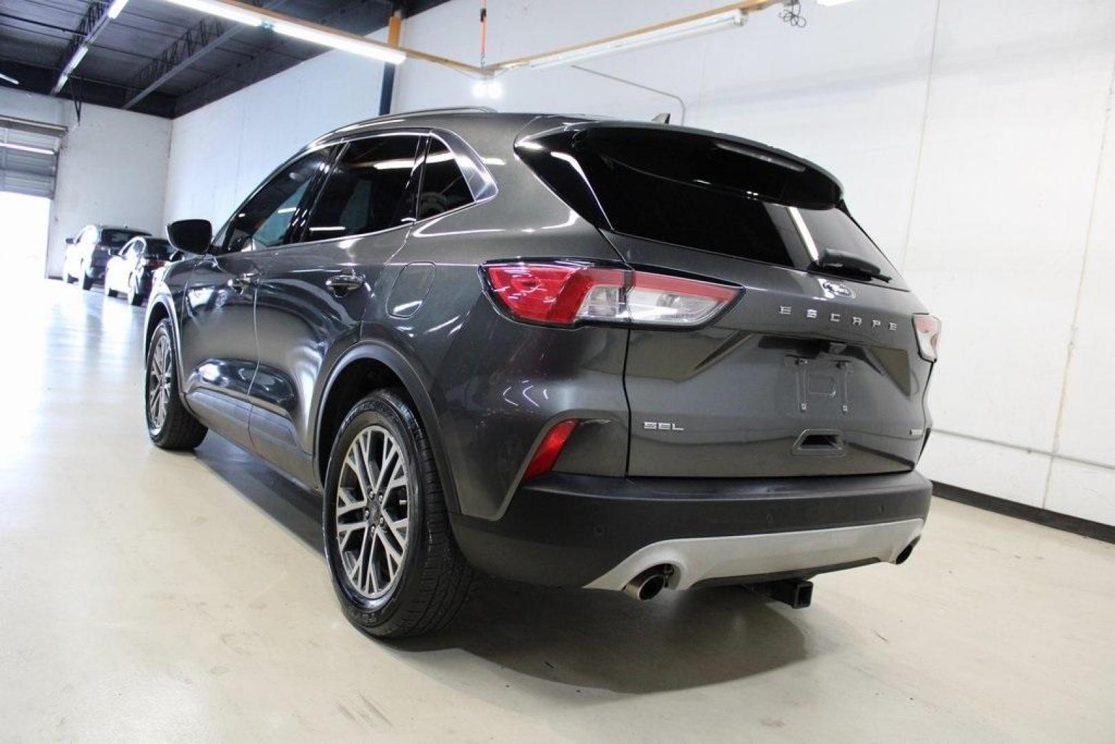 2020 Magnetic /Sandstone Ford Escape SEL (1FMCU0H6XLU) with an 1.5L EcoBoost engine, Automatic transmission, located at 15300 Midway Rd., Addison, TX, 75001, (972) 702-0011, 32.958321, -96.838074 - 2020 Ford Escape SEL<br>Now Available at Midway Auto Group Addison, Texas<br><br>Smart, efficient, and loaded with modern features, the 2020 Ford Escape SEL is a standout compact SUV that blends versatility, technology, and comfort. Whether you're commuting around DFW or heading out for a weekend t - Photo#3