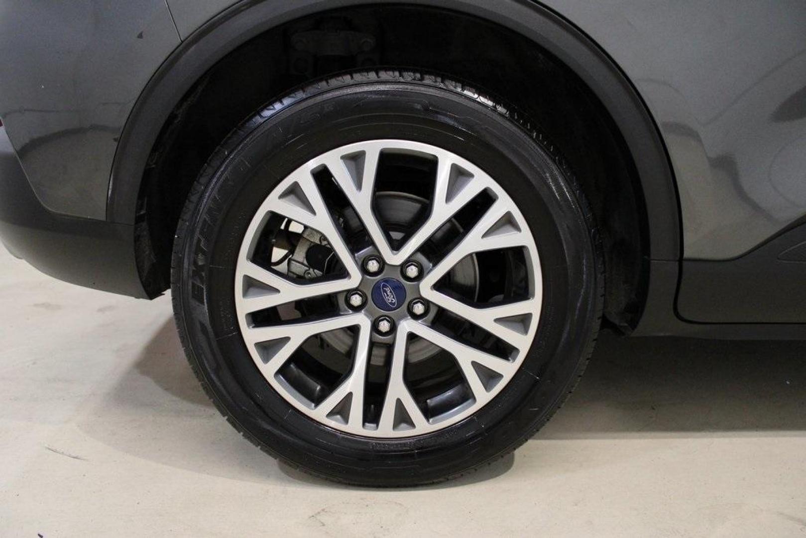 2020 Magnetic /Sandstone Ford Escape SEL (1FMCU0H6XLU) with an 1.5L EcoBoost engine, Automatic transmission, located at 15300 Midway Rd., Addison, TX, 75001, (972) 702-0011, 32.958321, -96.838074 - 2020 Ford Escape SEL<br>Now Available at Midway Auto Group Addison, Texas<br><br>Smart, efficient, and loaded with modern features, the 2020 Ford Escape SEL is a standout compact SUV that blends versatility, technology, and comfort. Whether you're commuting around DFW or heading out for a weekend t - Photo#10