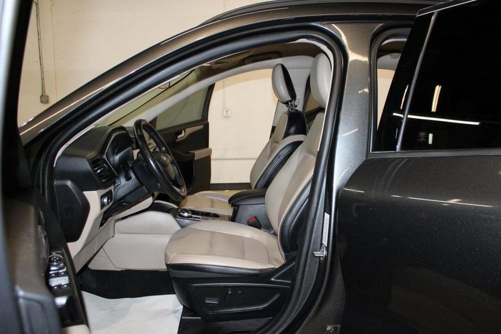 2020 Magnetic /Sandstone Ford Escape SEL (1FMCU0H6XLU) with an 1.5L EcoBoost engine, Automatic transmission, located at 15300 Midway Rd., Addison, TX, 75001, (972) 702-0011, 32.958321, -96.838074 - 2020 Ford Escape SEL<br>Now Available at Midway Auto Group Addison, Texas<br><br>Smart, efficient, and loaded with modern features, the 2020 Ford Escape SEL is a standout compact SUV that blends versatility, technology, and comfort. Whether you're commuting around DFW or heading out for a weekend t - Photo#12
