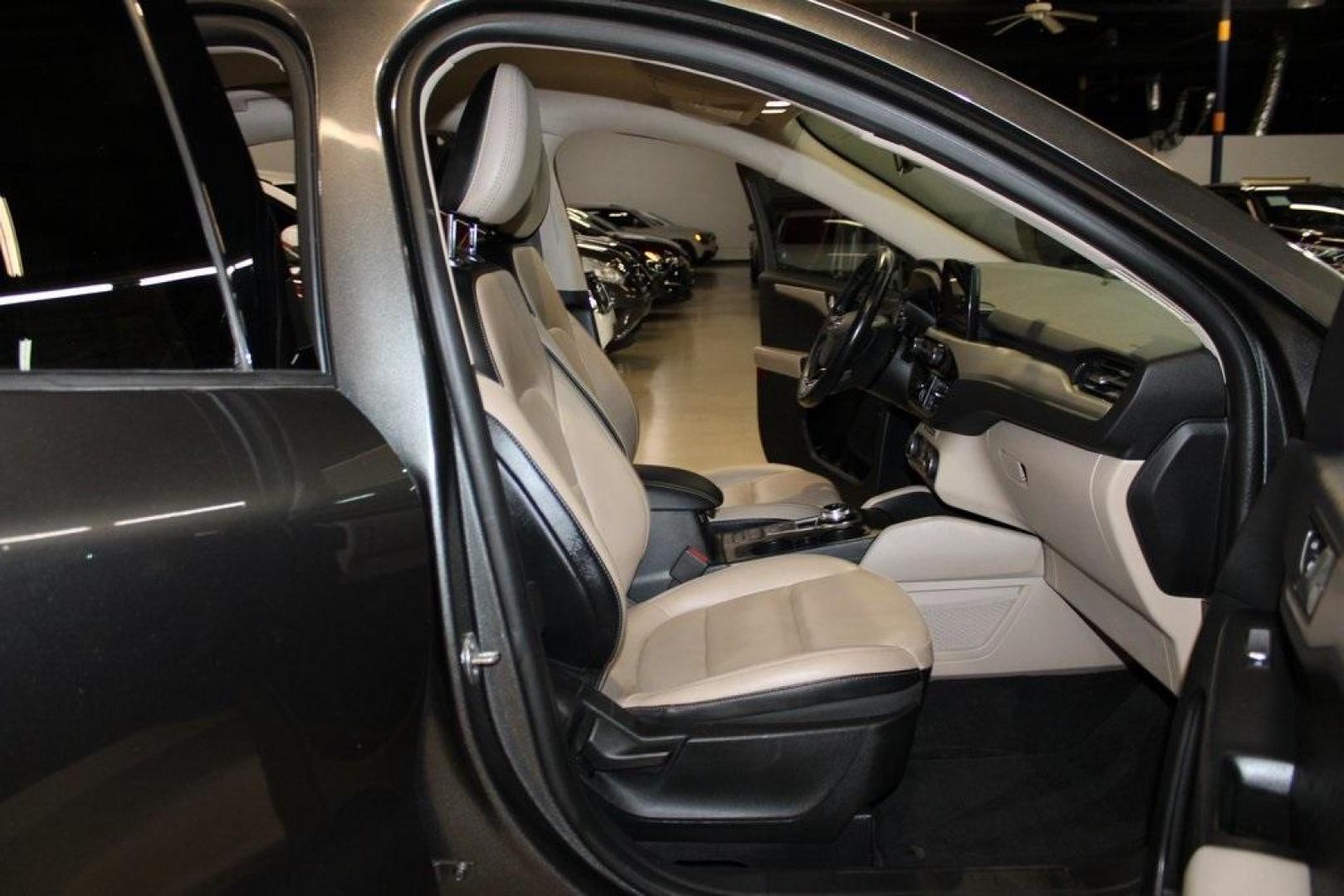 2020 Magnetic /Sandstone Ford Escape SEL (1FMCU0H6XLU) with an 1.5L EcoBoost engine, Automatic transmission, located at 15300 Midway Rd., Addison, TX, 75001, (972) 702-0011, 32.958321, -96.838074 - 2020 Ford Escape SEL<br>Now Available at Midway Auto Group Addison, Texas<br><br>Smart, efficient, and loaded with modern features, the 2020 Ford Escape SEL is a standout compact SUV that blends versatility, technology, and comfort. Whether you're commuting around DFW or heading out for a weekend t - Photo#13