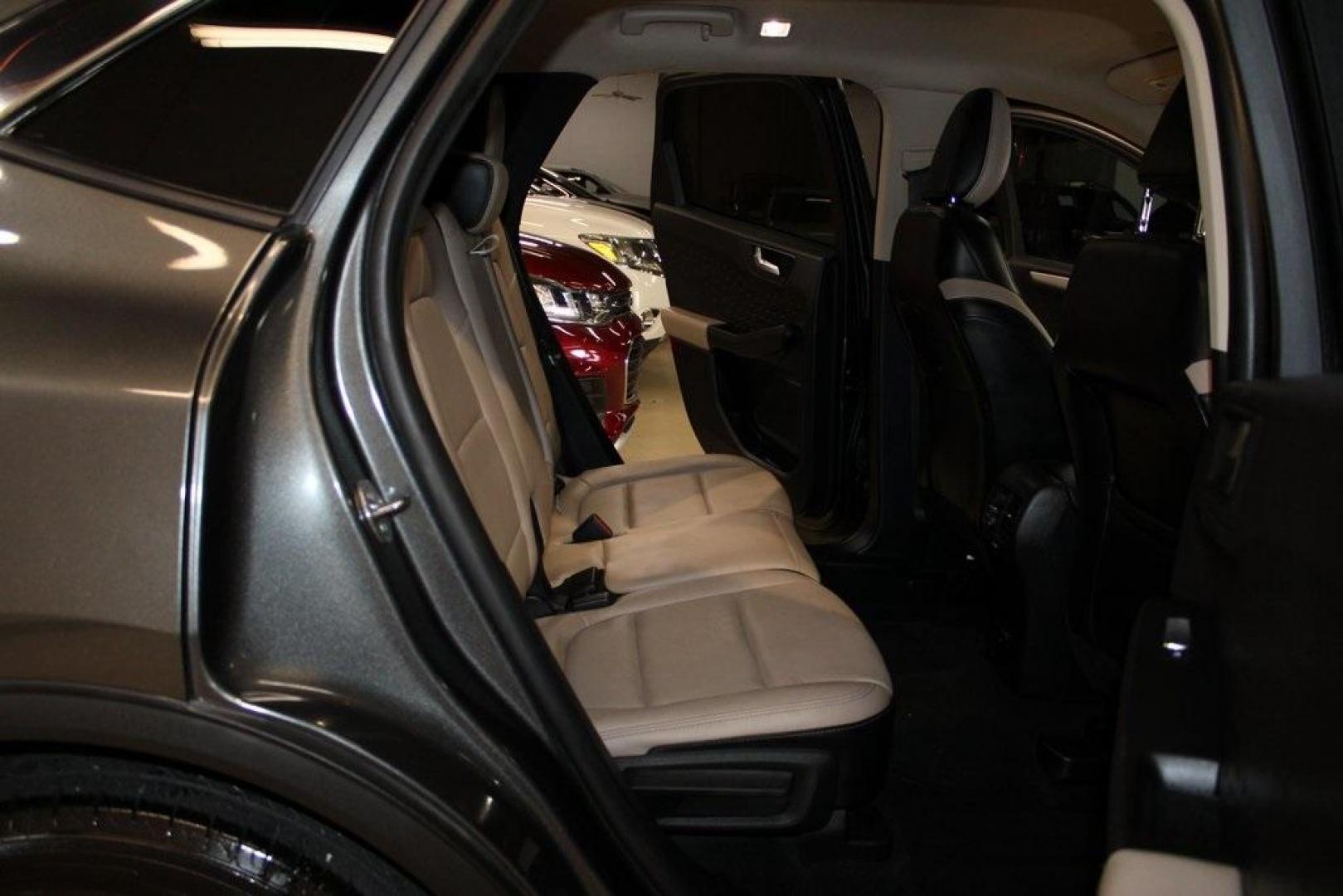 2020 Magnetic /Sandstone Ford Escape SEL (1FMCU0H6XLU) with an 1.5L EcoBoost engine, Automatic transmission, located at 15300 Midway Rd., Addison, TX, 75001, (972) 702-0011, 32.958321, -96.838074 - 2020 Ford Escape SEL<br>Now Available at Midway Auto Group Addison, Texas<br><br>Smart, efficient, and loaded with modern features, the 2020 Ford Escape SEL is a standout compact SUV that blends versatility, technology, and comfort. Whether you're commuting around DFW or heading out for a weekend t - Photo#14