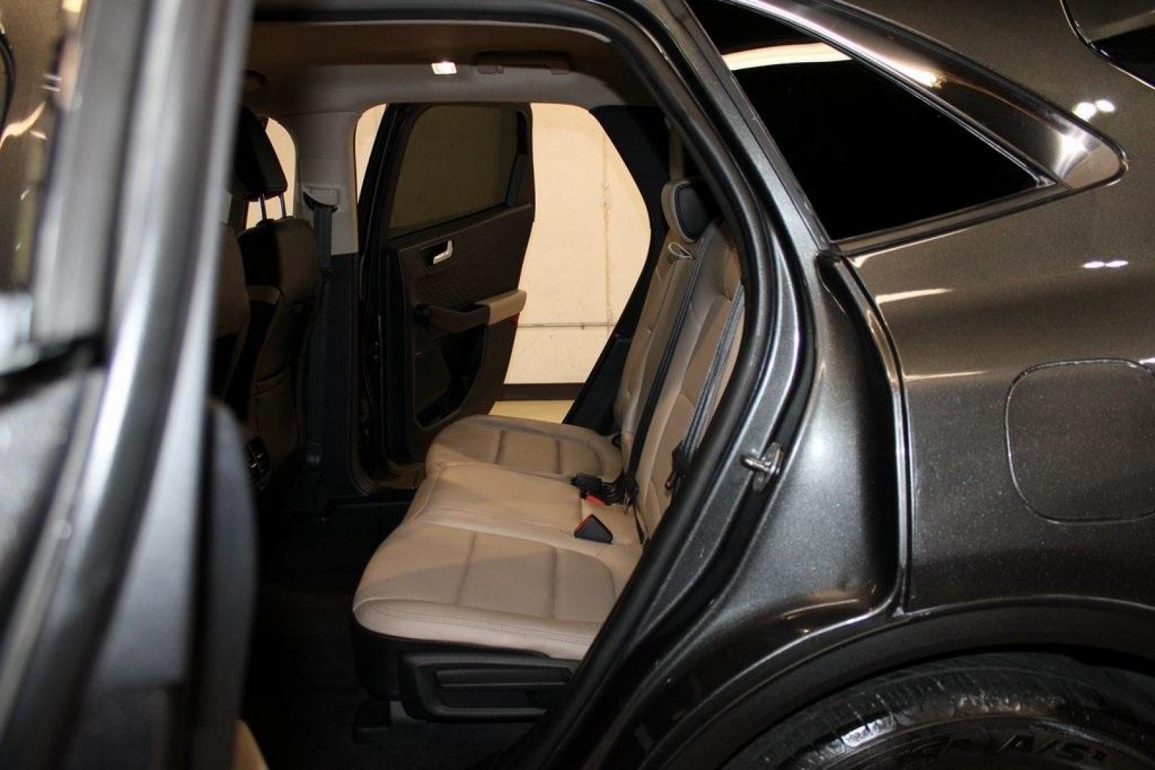 2020 Magnetic /Sandstone Ford Escape SEL (1FMCU0H6XLU) with an 1.5L EcoBoost engine, Automatic transmission, located at 15300 Midway Rd., Addison, TX, 75001, (972) 702-0011, 32.958321, -96.838074 - 2020 Ford Escape SEL<br>Now Available at Midway Auto Group Addison, Texas<br><br>Smart, efficient, and loaded with modern features, the 2020 Ford Escape SEL is a standout compact SUV that blends versatility, technology, and comfort. Whether you're commuting around DFW or heading out for a weekend t - Photo#15
