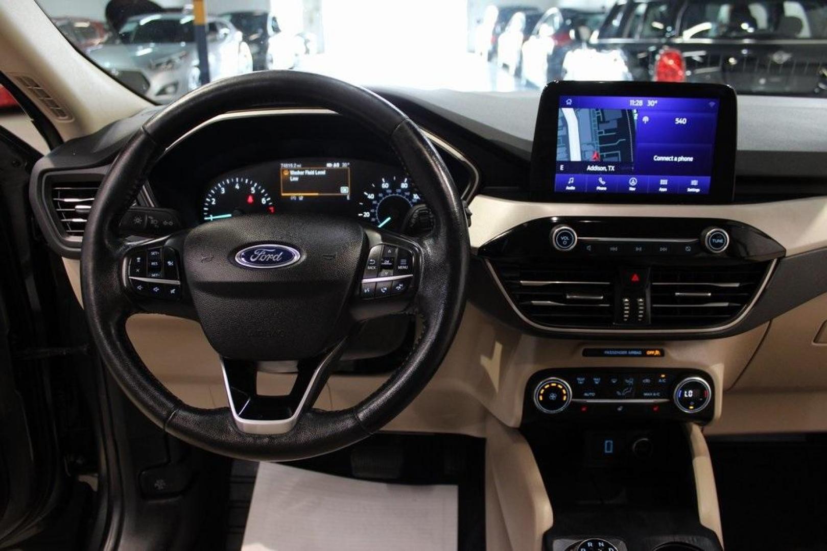2020 Magnetic /Sandstone Ford Escape SEL (1FMCU0H6XLU) with an 1.5L EcoBoost engine, Automatic transmission, located at 15300 Midway Rd., Addison, TX, 75001, (972) 702-0011, 32.958321, -96.838074 - 2020 Ford Escape SEL<br>Now Available at Midway Auto Group Addison, Texas<br><br>Smart, efficient, and loaded with modern features, the 2020 Ford Escape SEL is a standout compact SUV that blends versatility, technology, and comfort. Whether you're commuting around DFW or heading out for a weekend t - Photo#16