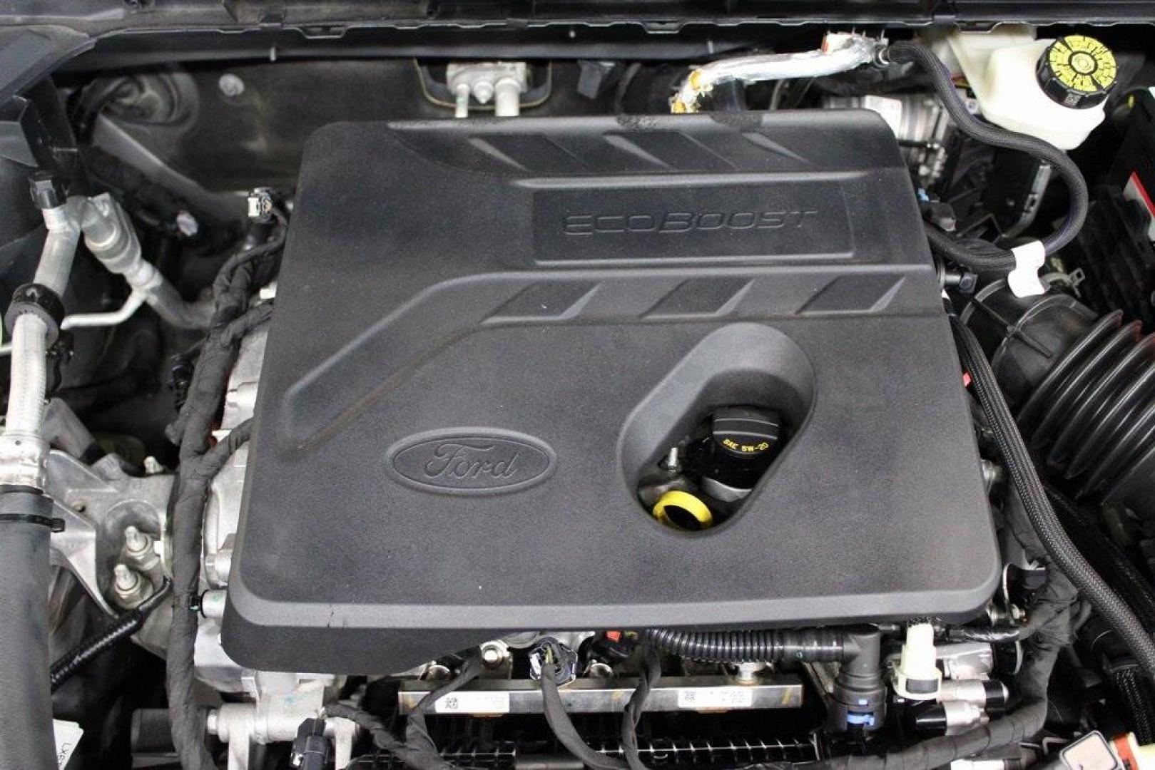 2020 Magnetic /Sandstone Ford Escape SEL (1FMCU0H6XLU) with an 1.5L EcoBoost engine, Automatic transmission, located at 15300 Midway Rd., Addison, TX, 75001, (972) 702-0011, 32.958321, -96.838074 - 2020 Ford Escape SEL<br>Now Available at Midway Auto Group Addison, Texas<br><br>Smart, efficient, and loaded with modern features, the 2020 Ford Escape SEL is a standout compact SUV that blends versatility, technology, and comfort. Whether you're commuting around DFW or heading out for a weekend t - Photo#27