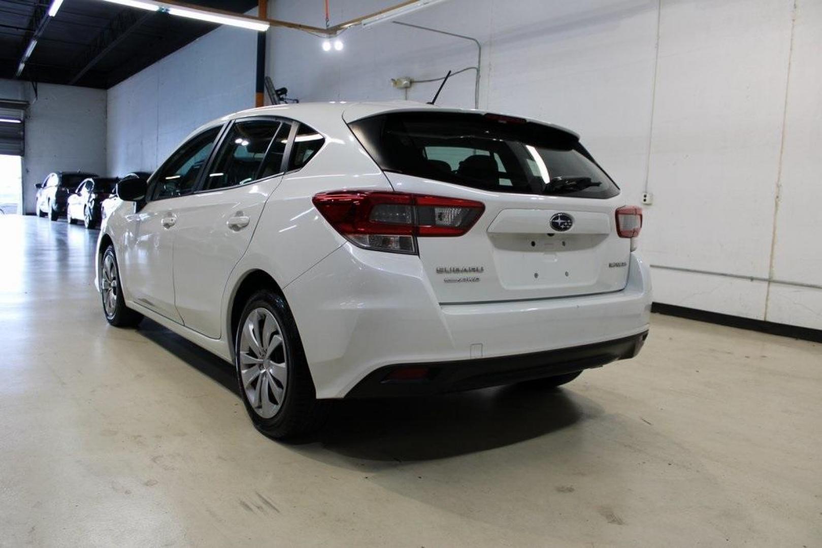2020 Whc /Ivory Subaru Impreza Base (4S3GTAB6XL3) with an 2.0L DOHC engine, CVT transmission, located at 15300 Midway Rd., Addison, TX, 75001, (972) 702-0011, 32.958321, -96.838074 - 2020 Subaru Impreza Base 5-Door AWD<br>Now Available at Midway Auto Group Addison, Texas<br><br>Reliable, versatile, and built for all-season confidence, the 2020 Subaru Impreza 5-Door offers the practicality of a hatchback with standard Symmetrical All-Wheel Drivea feature rarely found in its clas - Photo#3