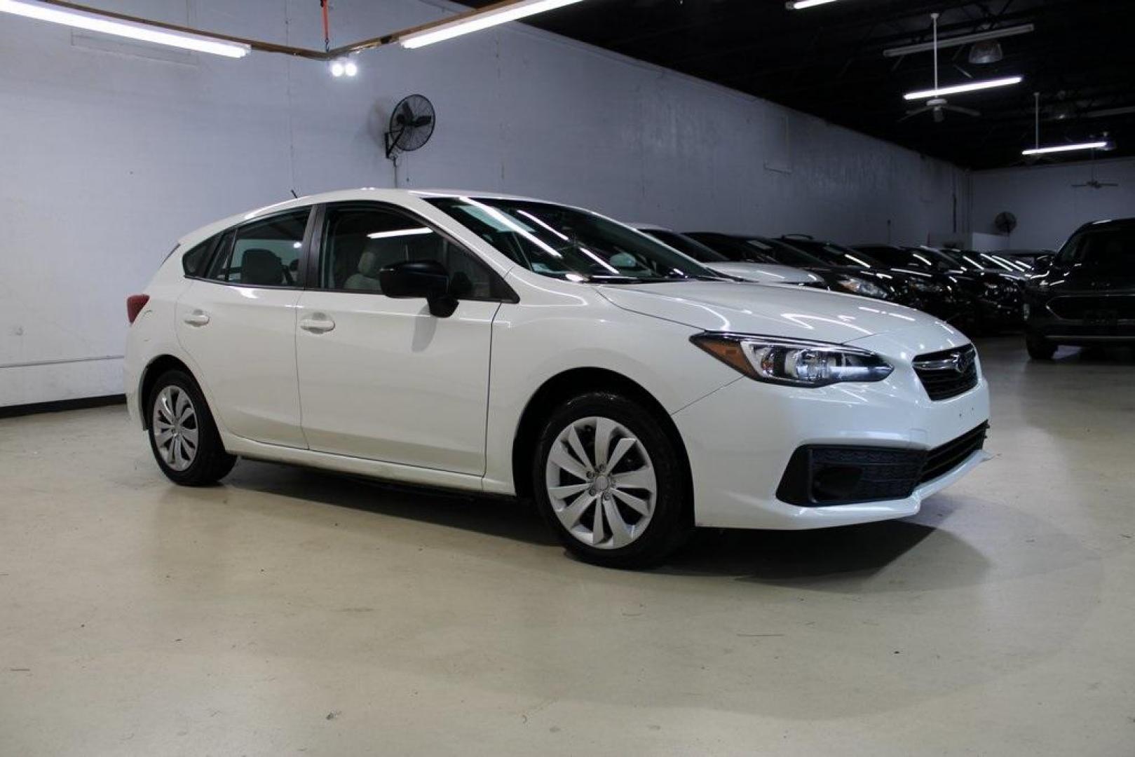 2020 Whc /Ivory Subaru Impreza Base (4S3GTAB6XL3) with an 2.0L DOHC engine, CVT transmission, located at 15300 Midway Rd., Addison, TX, 75001, (972) 702-0011, 32.958321, -96.838074 - 2020 Subaru Impreza Base 5-Door AWD<br>Now Available at Midway Auto Group Addison, Texas<br><br>Reliable, versatile, and built for all-season confidence, the 2020 Subaru Impreza 5-Door offers the practicality of a hatchback with standard Symmetrical All-Wheel Drivea feature rarely found in its clas - Photo#6