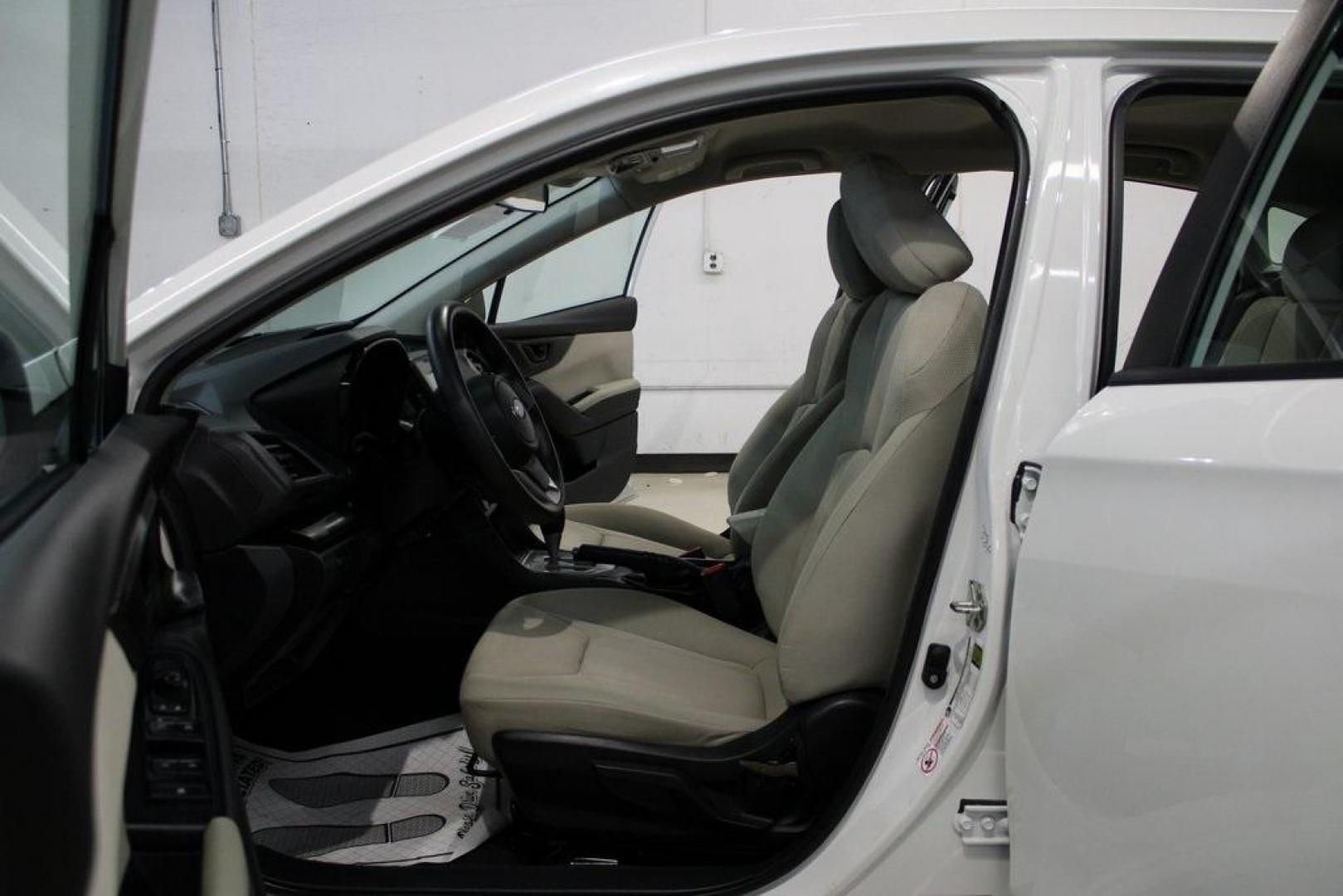 2020 Whc /Ivory Subaru Impreza Base (4S3GTAB6XL3) with an 2.0L DOHC engine, CVT transmission, located at 15300 Midway Rd., Addison, TX, 75001, (972) 702-0011, 32.958321, -96.838074 - 2020 Subaru Impreza Base 5-Door AWD<br>Now Available at Midway Auto Group Addison, Texas<br><br>Reliable, versatile, and built for all-season confidence, the 2020 Subaru Impreza 5-Door offers the practicality of a hatchback with standard Symmetrical All-Wheel Drivea feature rarely found in its clas - Photo#13