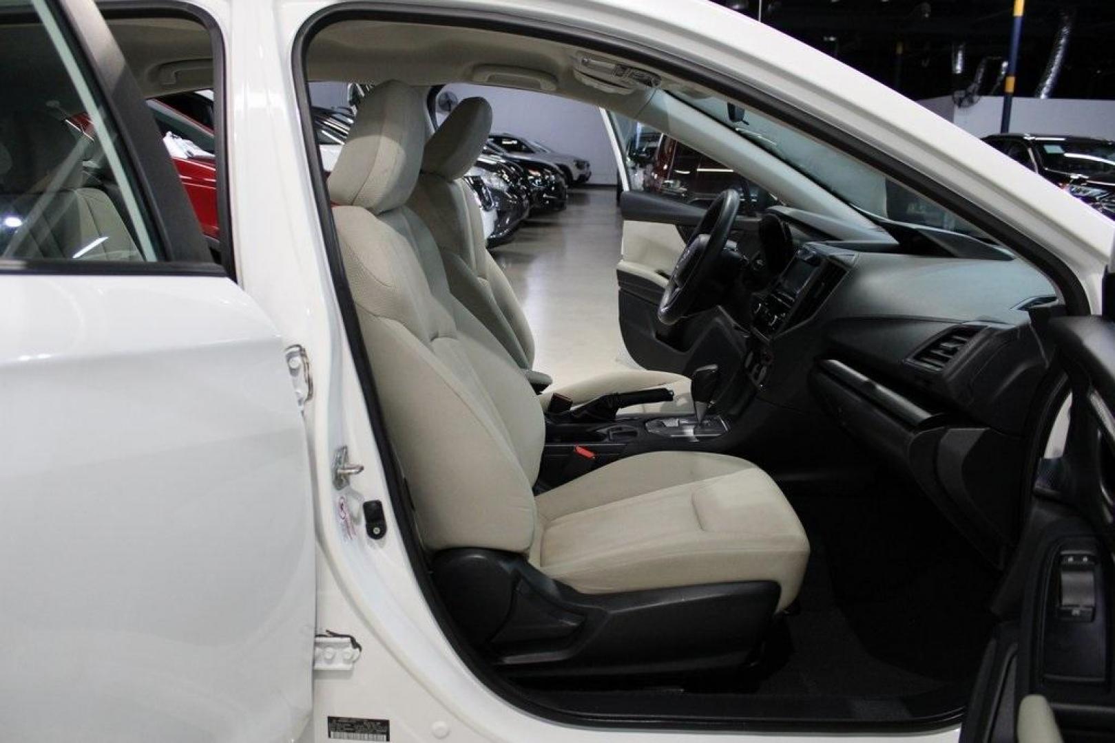 2020 Whc /Ivory Subaru Impreza Base (4S3GTAB6XL3) with an 2.0L DOHC engine, CVT transmission, located at 15300 Midway Rd., Addison, TX, 75001, (972) 702-0011, 32.958321, -96.838074 - 2020 Subaru Impreza Base 5-Door AWD<br>Now Available at Midway Auto Group Addison, Texas<br><br>Reliable, versatile, and built for all-season confidence, the 2020 Subaru Impreza 5-Door offers the practicality of a hatchback with standard Symmetrical All-Wheel Drivea feature rarely found in its clas - Photo#14
