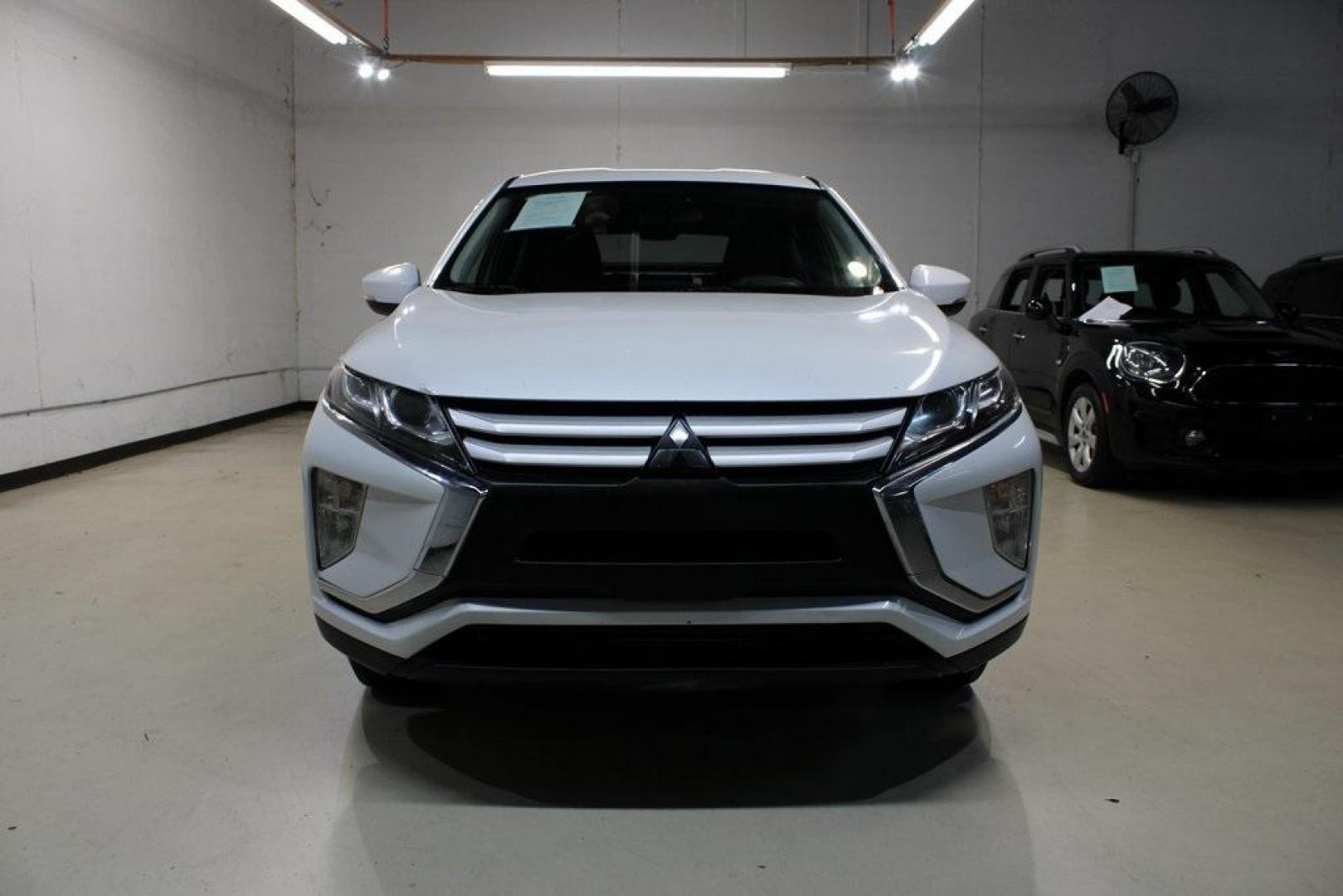 2020 Pearl White /Black Mitsubishi Eclipse Cross ES (JA4AS3AA2LZ) with an 1.5L I4 DI Turbocharged DOHC 16V LEV3-ULEV70 152hp engine, CVT transmission, located at 15300 Midway Rd., Addison, TX, 75001, (972) 702-0011, 32.958321, -96.838074 - 2020 Mitsubishi Outlander Sport ES<br>Now Available at Midway Auto Group Addison, Texas<br><br>The 2020 Mitsubishi Outlander Sport ES delivers bold styling, smart technology, and everyday functionality all in a compact SUV package. Whether you're commuting through the DFW area or heading out for a - Photo#4