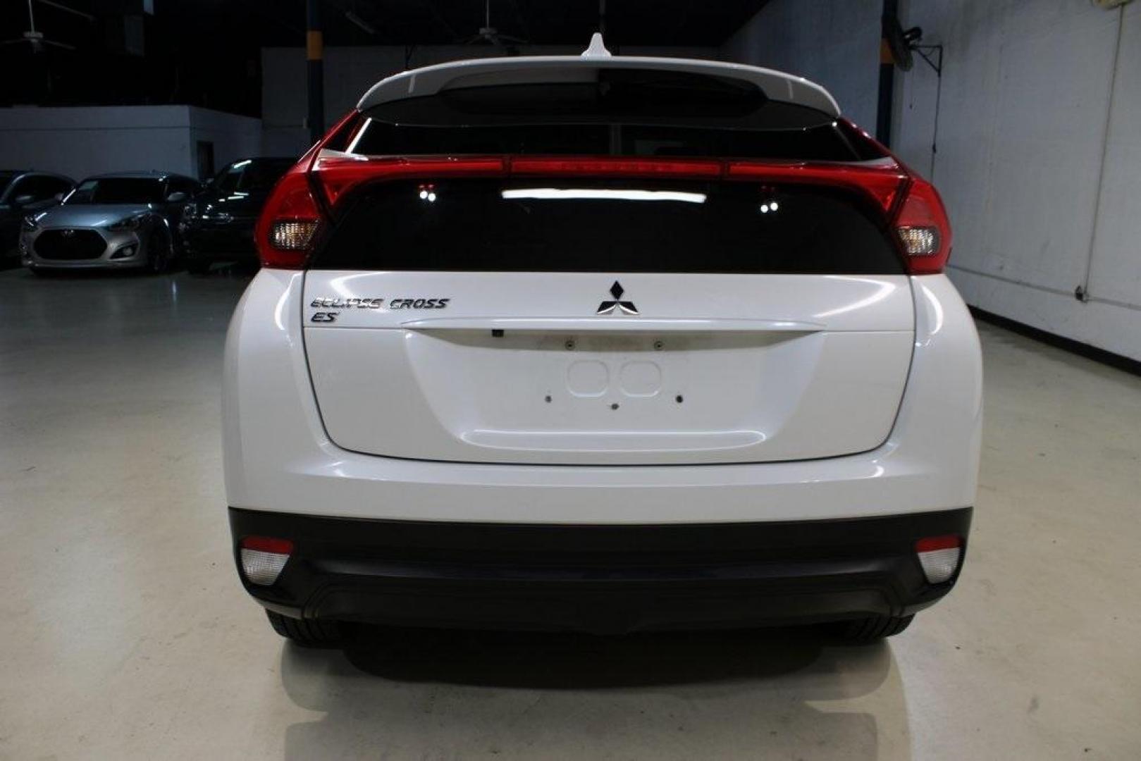 2020 Pearl White /Black Mitsubishi Eclipse Cross ES (JA4AS3AA2LZ) with an 1.5L I4 DI Turbocharged DOHC 16V LEV3-ULEV70 152hp engine, CVT transmission, located at 15300 Midway Rd., Addison, TX, 75001, (972) 702-0011, 32.958321, -96.838074 - 2020 Mitsubishi Outlander Sport ES<br>Now Available at Midway Auto Group Addison, Texas<br><br>The 2020 Mitsubishi Outlander Sport ES delivers bold styling, smart technology, and everyday functionality all in a compact SUV package. Whether you're commuting through the DFW area or heading out for a - Photo#6