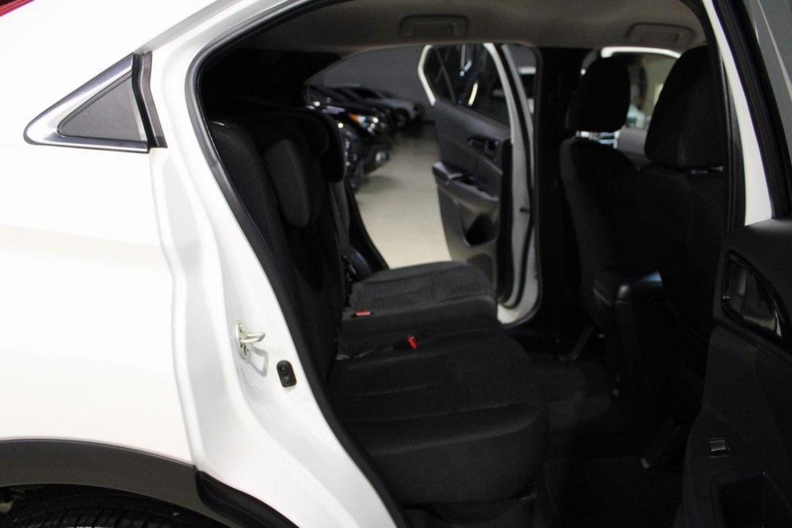 2020 Pearl White /Black Mitsubishi Eclipse Cross ES (JA4AS3AA2LZ) with an 1.5L I4 DI Turbocharged DOHC 16V LEV3-ULEV70 152hp engine, CVT transmission, located at 15300 Midway Rd., Addison, TX, 75001, (972) 702-0011, 32.958321, -96.838074 - 2020 Mitsubishi Outlander Sport ES<br>Now Available at Midway Auto Group Addison, Texas<br><br>The 2020 Mitsubishi Outlander Sport ES delivers bold styling, smart technology, and everyday functionality all in a compact SUV package. Whether you're commuting through the DFW area or heading out for a - Photo#12