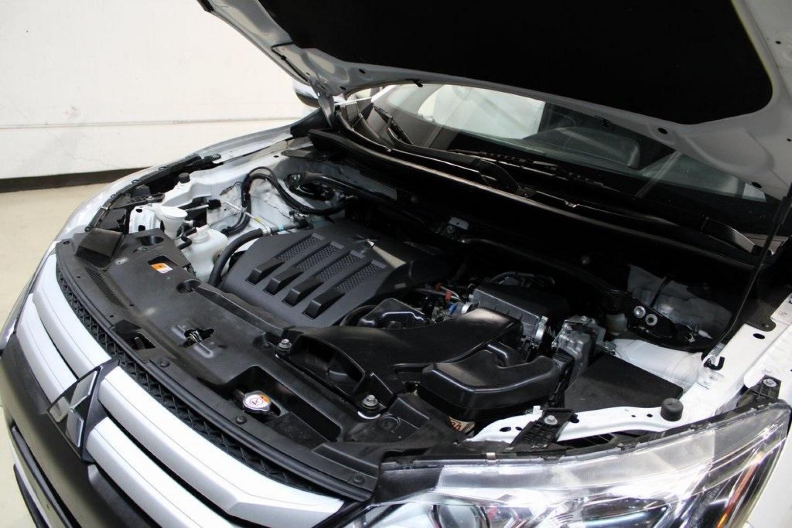 2020 Pearl White /Black Mitsubishi Eclipse Cross ES (JA4AS3AA2LZ) with an 1.5L I4 DI Turbocharged DOHC 16V LEV3-ULEV70 152hp engine, CVT transmission, located at 15300 Midway Rd., Addison, TX, 75001, (972) 702-0011, 32.958321, -96.838074 - 2020 Mitsubishi Outlander Sport ES<br>Now Available at Midway Auto Group Addison, Texas<br><br>The 2020 Mitsubishi Outlander Sport ES delivers bold styling, smart technology, and everyday functionality all in a compact SUV package. Whether you're commuting through the DFW area or heading out for a - Photo#25