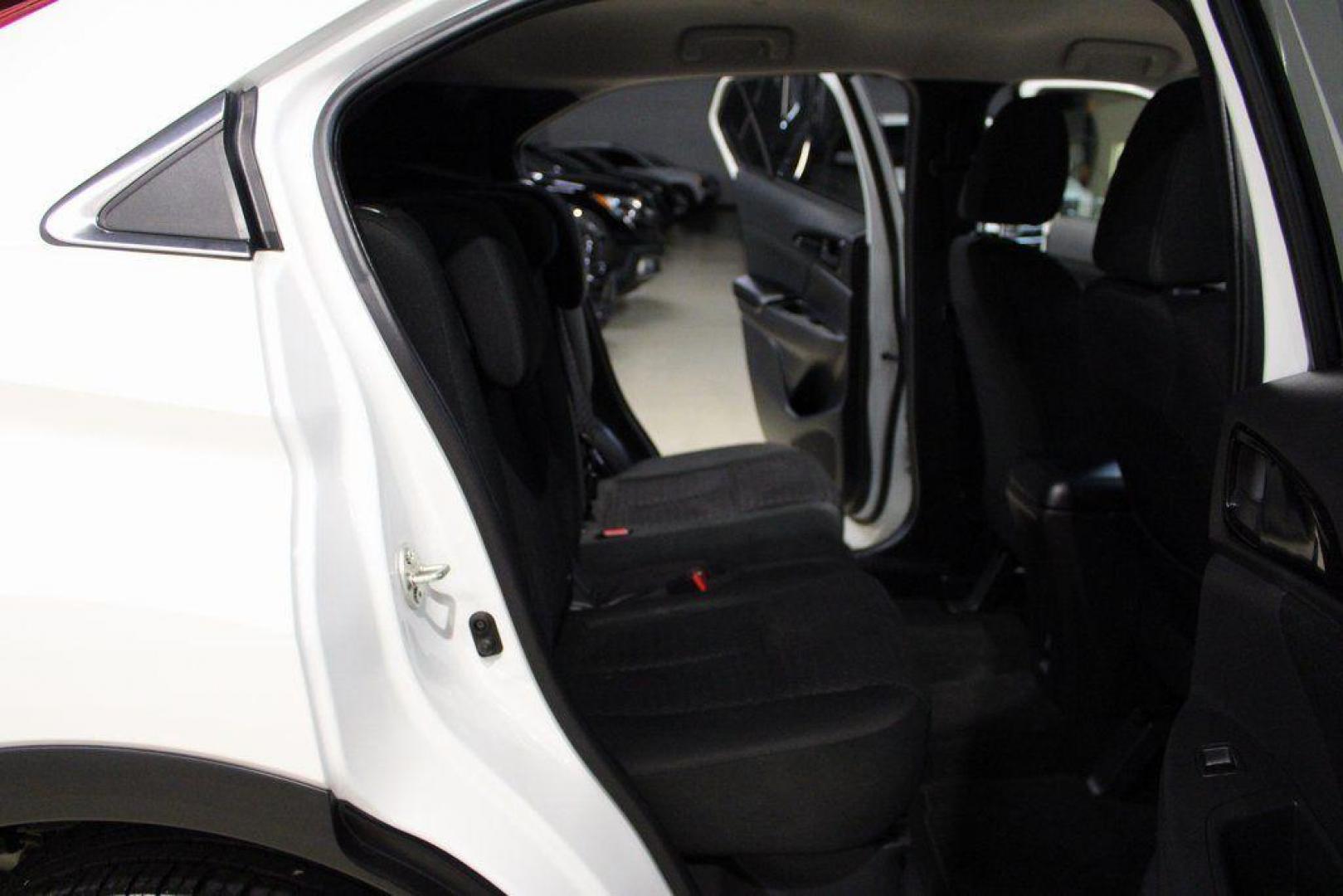 2020 Pearl White /Black Mitsubishi Eclipse Cross ES (JA4AS3AA2LZ) with an 1.5L I4 DI Turbocharged DOHC 16V LEV3-ULEV70 152hp engine, CVT transmission, located at 15300 Midway Rd., Addison, TX, 75001, (972) 702-0011, 32.958321, -96.838074 - Photo#12
