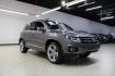 2014 Pepper / Gray /Black Volkswagen Tiguan R-Line (WVGAV3AX1EW) with an 2.0L TSI engine, Automatic transmission, located at 15300 Midway Rd., Addison, TX, 75001, (972) 702-0011, 32.958321, -96.838074 - 2014 Volkswagen Tiguan SE 4Motion<br>Now Available at Midway Auto Group Addison, Texas<br><br>Practicality meets refinement in the 2014 Volkswagen Tiguan SE 4Motiona compact SUV that delivers confident all-wheel drive performance, European styling, and a premium interior feel. Whether you're commut - Photo#1
