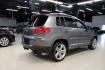 2014 Pepper / Gray /Black Volkswagen Tiguan R-Line (WVGAV3AX1EW) with an 2.0L TSI engine, Automatic transmission, located at 15300 Midway Rd., Addison, TX, 75001, (972) 702-0011, 32.958321, -96.838074 - 2014 Volkswagen Tiguan SE 4Motion<br>Now Available at Midway Auto Group Addison, Texas<br><br>Practicality meets refinement in the 2014 Volkswagen Tiguan SE 4Motiona compact SUV that delivers confident all-wheel drive performance, European styling, and a premium interior feel. Whether you're commut - Photo#2