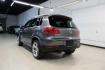 2014 Pepper / Gray /Black Volkswagen Tiguan R-Line (WVGAV3AX1EW) with an 2.0L TSI engine, Automatic transmission, located at 15300 Midway Rd., Addison, TX, 75001, (972) 702-0011, 32.958321, -96.838074 - 2014 Volkswagen Tiguan SE 4Motion<br>Now Available at Midway Auto Group Addison, Texas<br><br>Practicality meets refinement in the 2014 Volkswagen Tiguan SE 4Motiona compact SUV that delivers confident all-wheel drive performance, European styling, and a premium interior feel. Whether you're commut - Photo#3