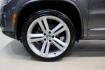 2014 Pepper / Gray /Black Volkswagen Tiguan R-Line (WVGAV3AX1EW) with an 2.0L TSI engine, Automatic transmission, located at 15300 Midway Rd., Addison, TX, 75001, (972) 702-0011, 32.958321, -96.838074 - 2014 Volkswagen Tiguan SE 4Motion<br>Now Available at Midway Auto Group Addison, Texas<br><br>Practicality meets refinement in the 2014 Volkswagen Tiguan SE 4Motiona compact SUV that delivers confident all-wheel drive performance, European styling, and a premium interior feel. Whether you're commut - Photo#8