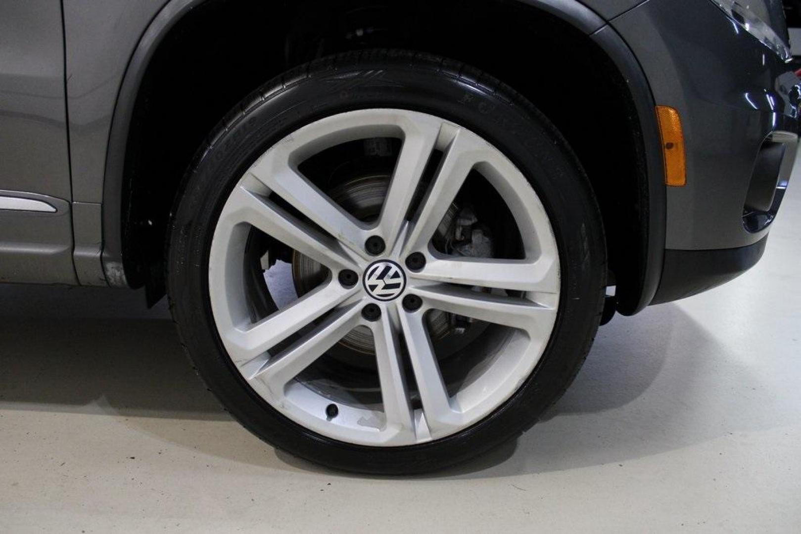 2014 Pepper / Gray /Black Volkswagen Tiguan R-Line (WVGAV3AX1EW) with an 2.0L TSI engine, Automatic transmission, located at 15300 Midway Rd., Addison, TX, 75001, (972) 702-0011, 32.958321, -96.838074 - 2014 Volkswagen Tiguan SE 4Motion<br>Now Available at Midway Auto Group Addison, Texas<br><br>Practicality meets refinement in the 2014 Volkswagen Tiguan SE 4Motiona compact SUV that delivers confident all-wheel drive performance, European styling, and a premium interior feel. Whether you're commut - Photo#11