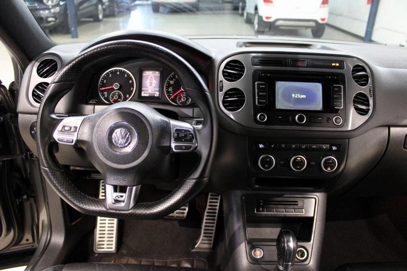 2014 Pepper / Gray /Black Volkswagen Tiguan R-Line (WVGAV3AX1EW) with an 2.0L TSI engine, Automatic transmission, located at 15300 Midway Rd., Addison, TX, 75001, (972) 702-0011, 32.958321, -96.838074 - 2014 Volkswagen Tiguan SE 4Motion<br>Now Available at Midway Auto Group Addison, Texas<br><br>Practicality meets refinement in the 2014 Volkswagen Tiguan SE 4Motiona compact SUV that delivers confident all-wheel drive performance, European styling, and a premium interior feel. Whether you're commut - Photo#17
