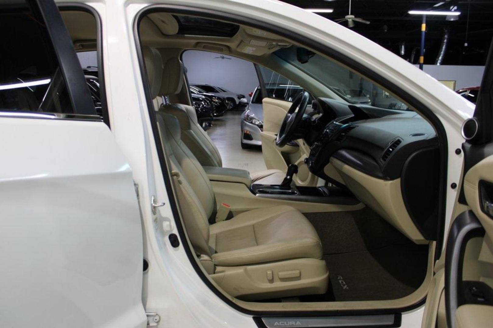 2015 White Diamond Pearl /Ebony Acura RDX Base (5J8TB4H32FL) with an 3.5L V6 SOHC i-VTEC 24V engine, Automatic transmission, located at 15300 Midway Rd., Addison, TX, 75001, (972) 702-0011, 32.958321, -96.838074 - 2015 Acura RDX w/ Technology Package<br>Now Available at Midway Auto Group Addison, Texas<br><br>Luxury, reliability, and performance come together in the 2015 Acura RDX with Technology Packagea premium compact SUV designed to elevate your driving experience. With upscale features, confident handli - Photo#12