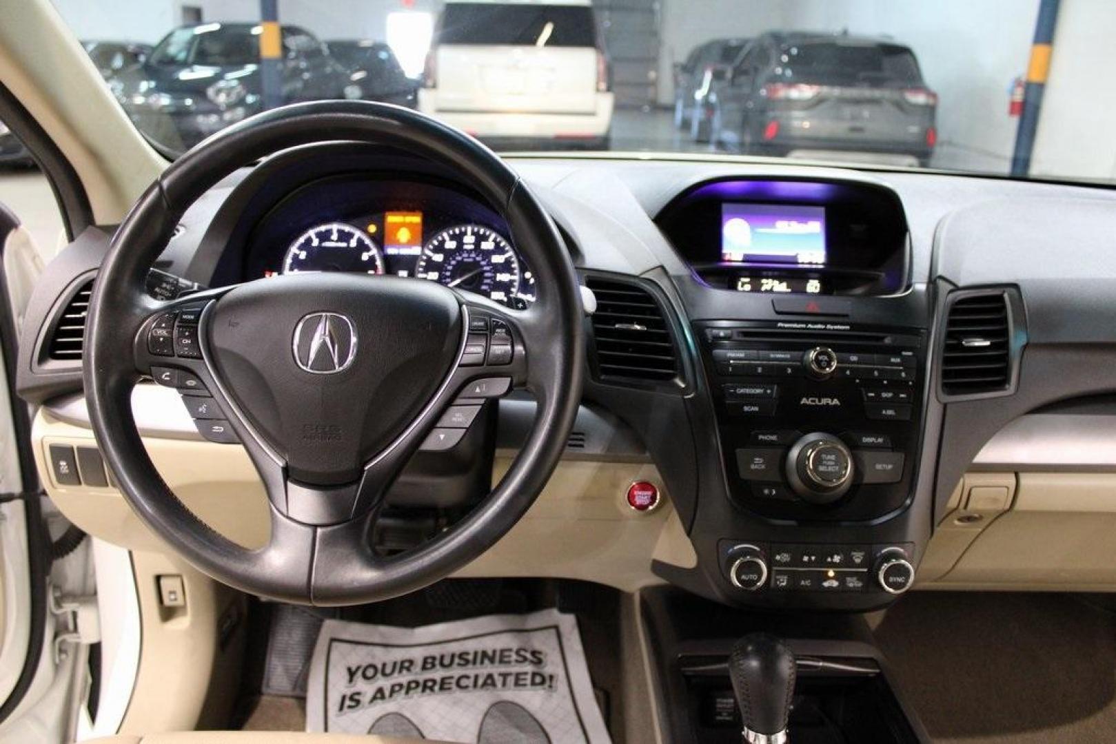 2015 White Diamond Pearl /Ebony Acura RDX Base (5J8TB4H32FL) with an 3.5L V6 SOHC i-VTEC 24V engine, Automatic transmission, located at 15300 Midway Rd., Addison, TX, 75001, (972) 702-0011, 32.958321, -96.838074 - 2015 Acura RDX w/ Technology Package<br>Now Available at Midway Auto Group Addison, Texas<br><br>Luxury, reliability, and performance come together in the 2015 Acura RDX with Technology Packagea premium compact SUV designed to elevate your driving experience. With upscale features, confident handli - Photo#15