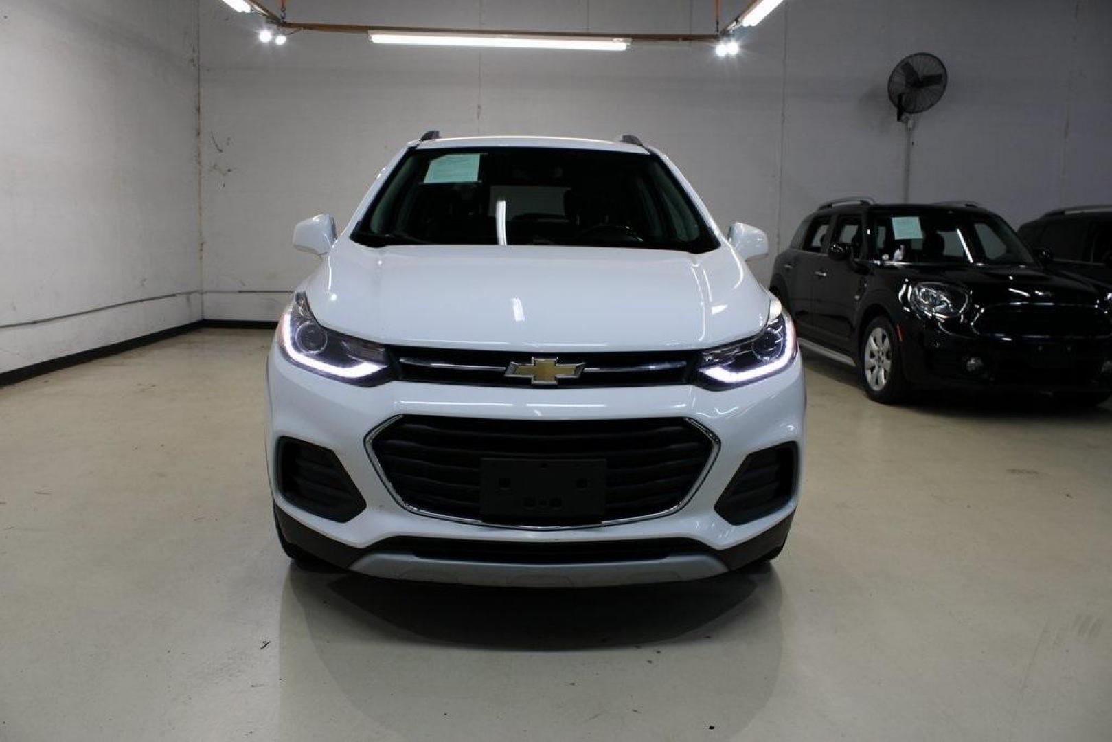 2018 Summit White /Jet Black Chevrolet Trax LT (KL7CJLSB5JB) with an ECOTEC 1.4L I4 SMPI DOHC Turbocharged VVT engine, Automatic transmission, located at 15300 Midway Rd., Addison, TX, 75001, (972) 702-0011, 32.958321, -96.838074 - 2018 Chevrolet Trax LT<br>Now Available at Midway Auto Group Addison, Texas<br><br>Compact in size but big on versatility, the 2018 Chevrolet Trax LT is a smart choice for drivers looking for efficiency, maneuverability, and modern convenience. Whether you're navigating Dallas traffic or planning a - Photo#6