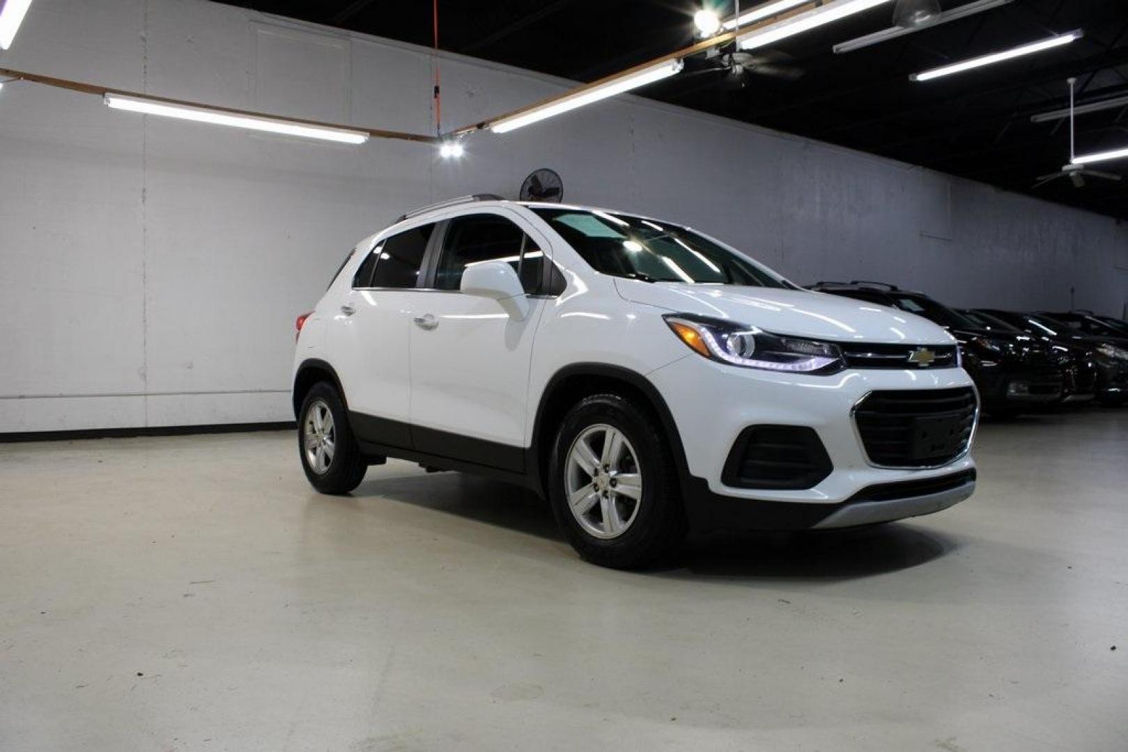 2018 Summit White /Jet Black Chevrolet Trax LT (KL7CJLSB5JB) with an ECOTEC 1.4L I4 SMPI DOHC Turbocharged VVT engine, Automatic transmission, located at 15300 Midway Rd., Addison, TX, 75001, (972) 702-0011, 32.958321, -96.838074 - 2018 Chevrolet Trax LT<br>Now Available at Midway Auto Group Addison, Texas<br><br>Compact in size but big on versatility, the 2018 Chevrolet Trax LT is a smart choice for drivers looking for efficiency, maneuverability, and modern convenience. Whether you're navigating Dallas traffic or planning a - Photo#7