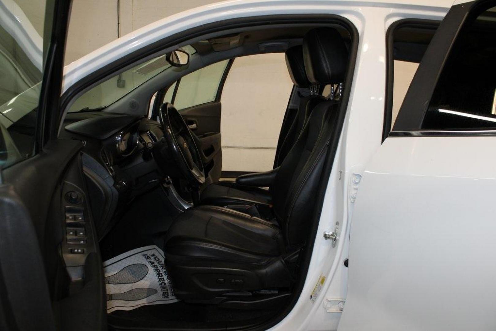 2018 Summit White /Jet Black Chevrolet Trax LT (KL7CJLSB5JB) with an ECOTEC 1.4L I4 SMPI DOHC Turbocharged VVT engine, Automatic transmission, located at 15300 Midway Rd., Addison, TX, 75001, (972) 702-0011, 32.958321, -96.838074 - 2018 Chevrolet Trax LT<br>Now Available at Midway Auto Group Addison, Texas<br><br>Compact in size but big on versatility, the 2018 Chevrolet Trax LT is a smart choice for drivers looking for efficiency, maneuverability, and modern convenience. Whether you're navigating Dallas traffic or planning a - Photo#14