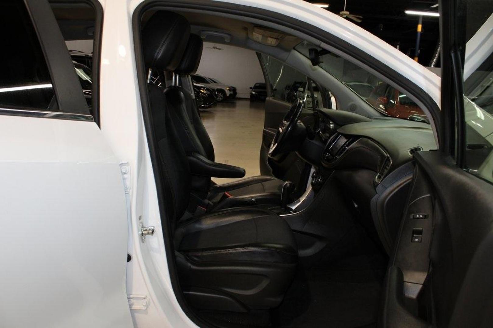 2018 Summit White /Jet Black Chevrolet Trax LT (KL7CJLSB5JB) with an ECOTEC 1.4L I4 SMPI DOHC Turbocharged VVT engine, Automatic transmission, located at 15300 Midway Rd., Addison, TX, 75001, (972) 702-0011, 32.958321, -96.838074 - 2018 Chevrolet Trax LT<br>Now Available at Midway Auto Group Addison, Texas<br><br>Compact in size but big on versatility, the 2018 Chevrolet Trax LT is a smart choice for drivers looking for efficiency, maneuverability, and modern convenience. Whether you're navigating Dallas traffic or planning a - Photo#15