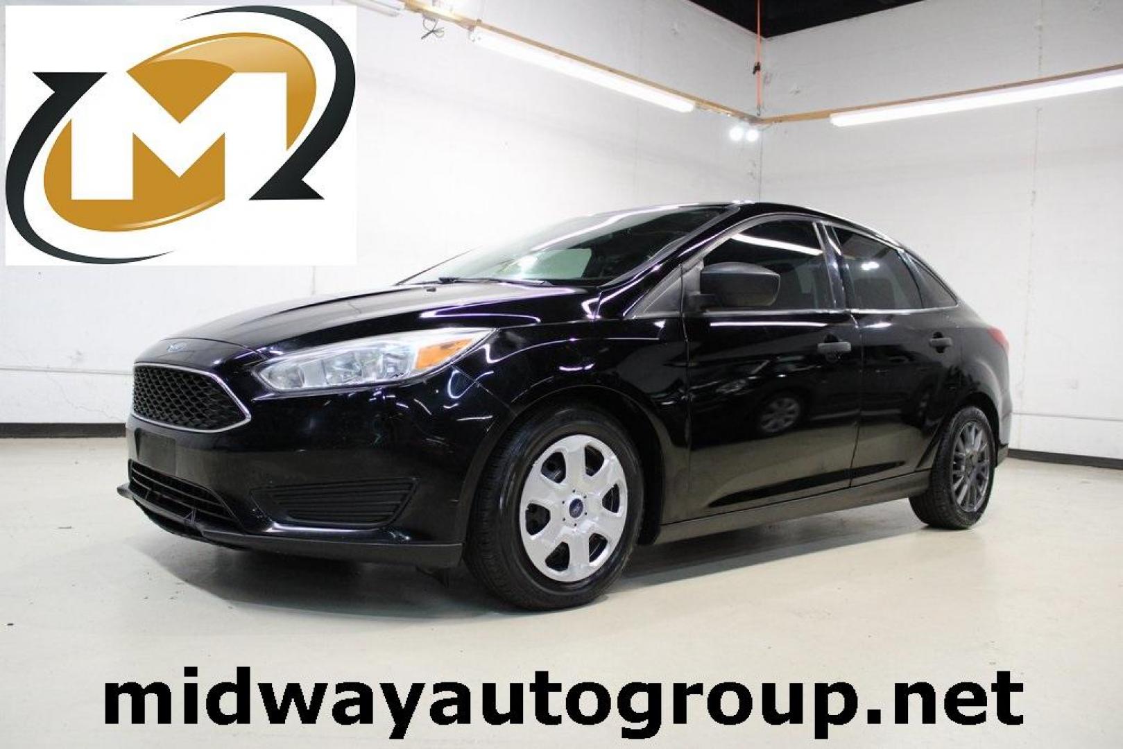 2018 Shadow Black /Charcoal Black Ford Focus S (1FADP3E20JL) with an 2.0L I4 DGI Ti-VCT engine, Automatic transmission, located at 15300 Midway Rd., Addison, TX, 75001, (972) 702-0011, 32.958321, -96.838074 - 2018 Ford Focus S<br>Now Available at Midway Auto Group Addison, Texas<br><br>Efficient, reliable, and fun to drivethe 2018 Ford Focus S is a compact sedan that offers outstanding value for daily commuters, first-time buyers, or anyone looking for practical, affordable transportation. With its nimb - Photo#0