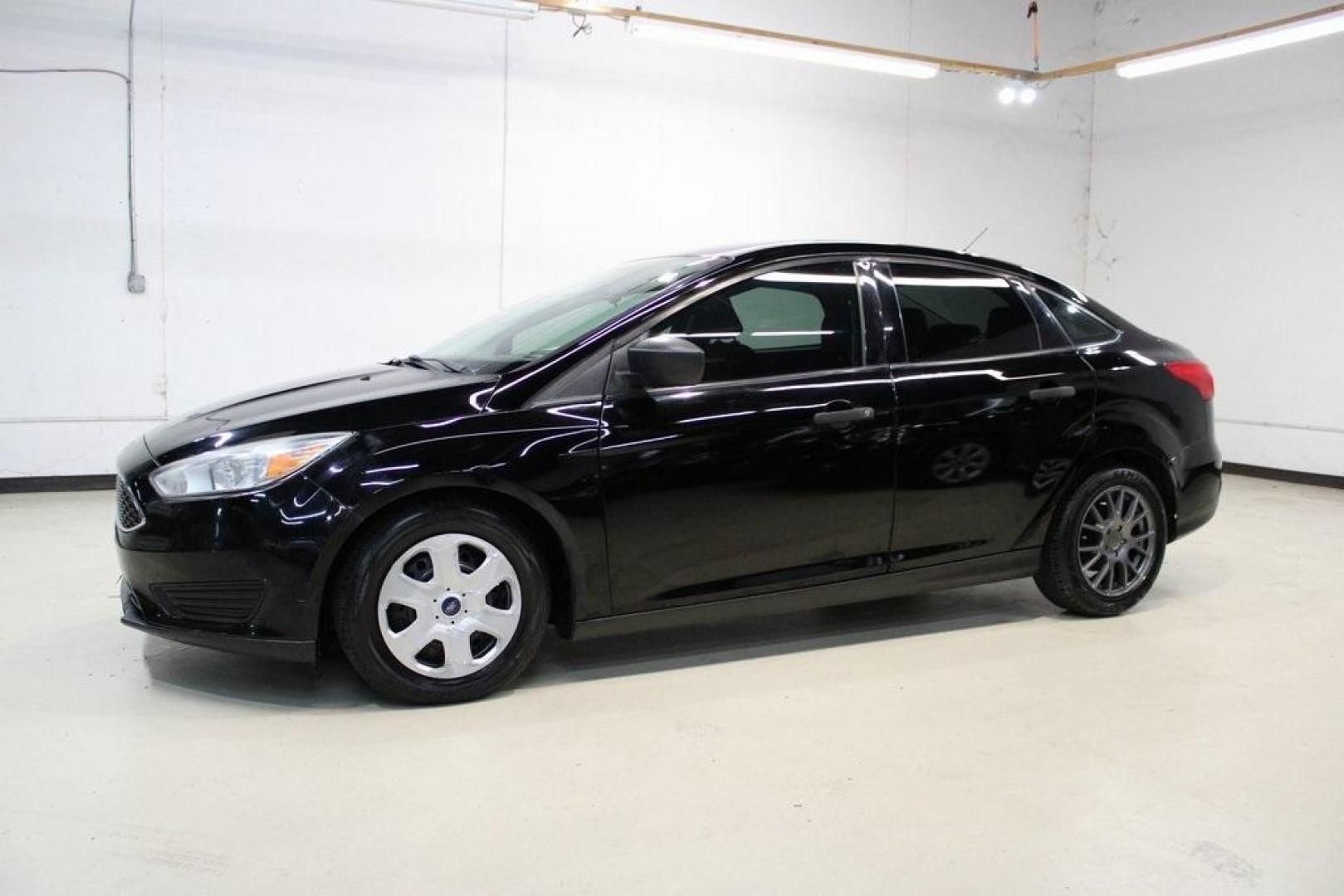 2018 Shadow Black /Charcoal Black Ford Focus S (1FADP3E20JL) with an 2.0L I4 DGI Ti-VCT engine, Automatic transmission, located at 15300 Midway Rd., Addison, TX, 75001, (972) 702-0011, 32.958321, -96.838074 - 2018 Ford Focus S<br>Now Available at Midway Auto Group Addison, Texas<br><br>Efficient, reliable, and fun to drivethe 2018 Ford Focus S is a compact sedan that offers outstanding value for daily commuters, first-time buyers, or anyone looking for practical, affordable transportation. With its nimb - Photo#4