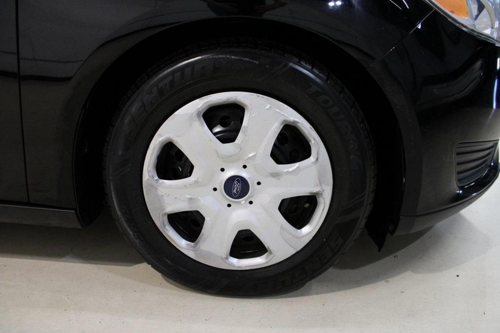 2018 Shadow Black /Charcoal Black Ford Focus S (1FADP3E20JL) with an 2.0L I4 DGI Ti-VCT engine, Automatic transmission, located at 15300 Midway Rd., Addison, TX, 75001, (972) 702-0011, 32.958321, -96.838074 - 2018 Ford Focus S<br>Now Available at Midway Auto Group Addison, Texas<br><br>Efficient, reliable, and fun to drivethe 2018 Ford Focus S is a compact sedan that offers outstanding value for daily commuters, first-time buyers, or anyone looking for practical, affordable transportation. With its nimb - Photo#11