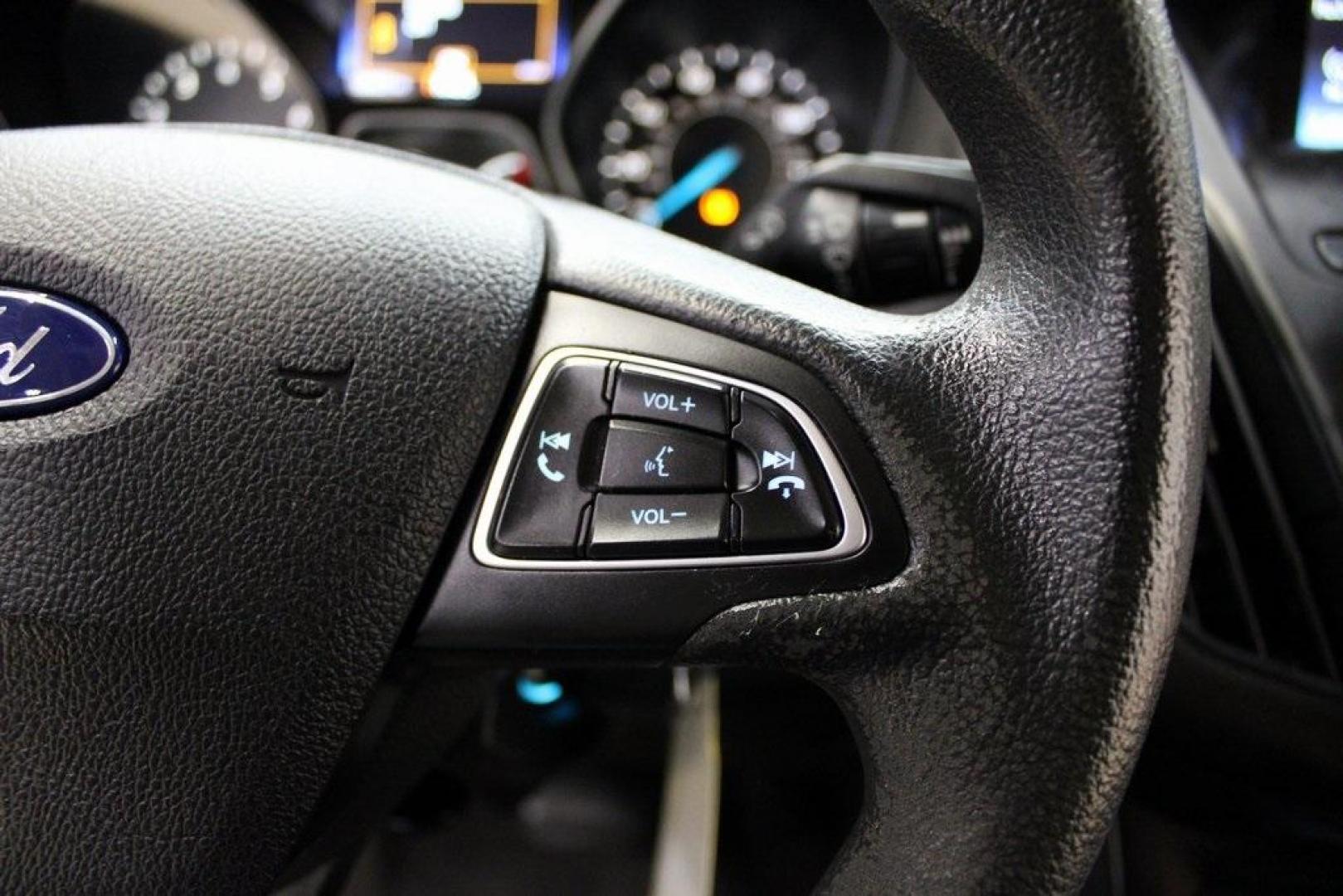 2018 Shadow Black /Charcoal Black Ford Focus S (1FADP3E20JL) with an 2.0L I4 DGI Ti-VCT engine, Automatic transmission, located at 15300 Midway Rd., Addison, TX, 75001, (972) 702-0011, 32.958321, -96.838074 - 2018 Ford Focus S<br>Now Available at Midway Auto Group Addison, Texas<br><br>Efficient, reliable, and fun to drivethe 2018 Ford Focus S is a compact sedan that offers outstanding value for daily commuters, first-time buyers, or anyone looking for practical, affordable transportation. With its nimb - Photo#22