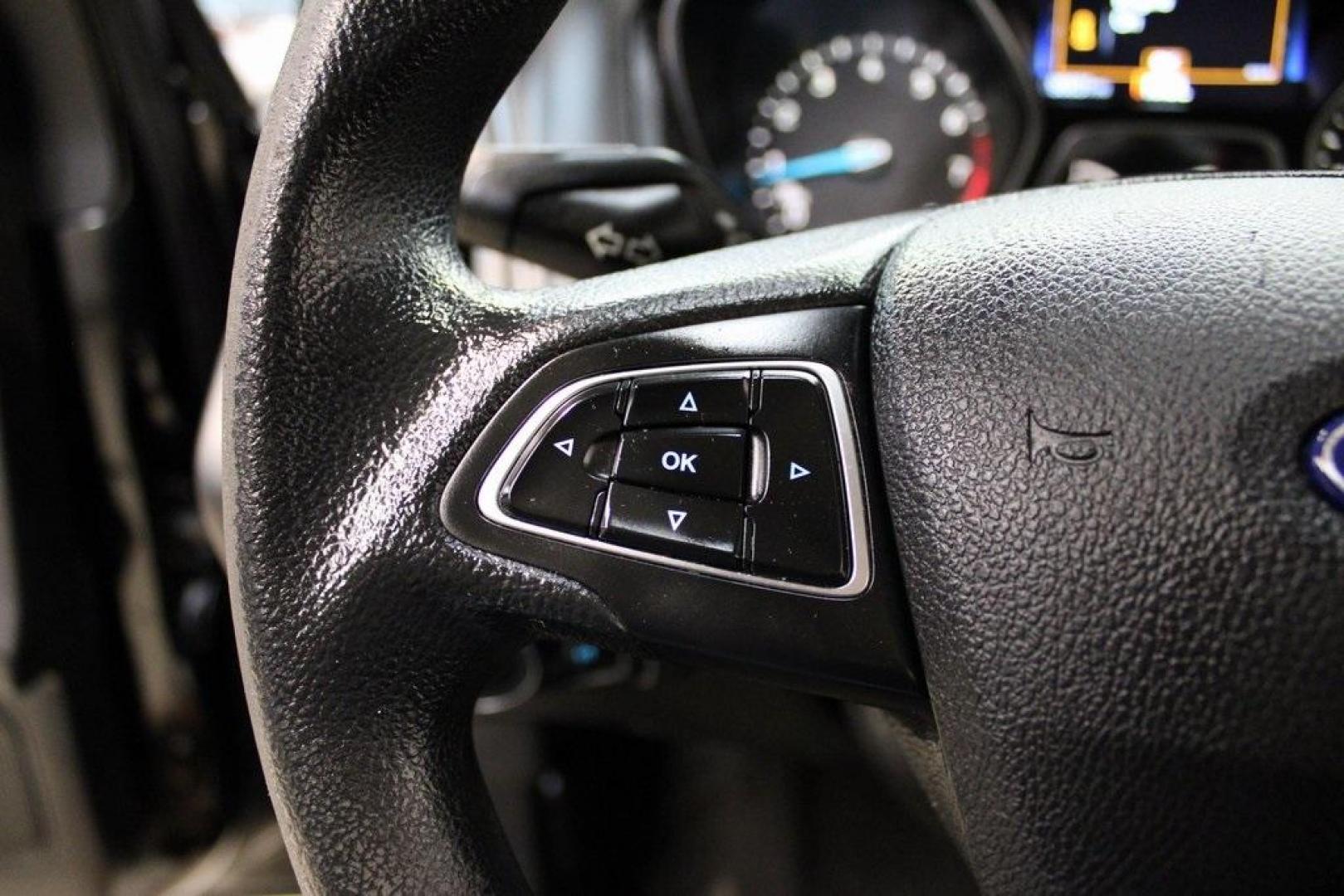 2018 Shadow Black /Charcoal Black Ford Focus S (1FADP3E20JL) with an 2.0L I4 DGI Ti-VCT engine, Automatic transmission, located at 15300 Midway Rd., Addison, TX, 75001, (972) 702-0011, 32.958321, -96.838074 - 2018 Ford Focus S<br>Now Available at Midway Auto Group Addison, Texas<br><br>Efficient, reliable, and fun to drivethe 2018 Ford Focus S is a compact sedan that offers outstanding value for daily commuters, first-time buyers, or anyone looking for practical, affordable transportation. With its nimb - Photo#23