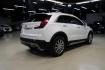 2021 Crystal White Tricoat /Black Cadillac XT4 Premium Luxury (1GYFZCR48MF) with an 2.0L I4 Turbocharged engine, Automatic transmission, located at 15300 Midway Rd., Addison, TX, 75001, (972) 702-0011, 32.958321, -96.838074 - 2021 Cadillac XT4 Premium Luxury<br>Now Available at Midway Auto Group Addison, Texas<br><br>Elevate your everyday drive with the 2021 Cadillac XT4 Premium Luxury a compact luxury SUV that blends bold styling, advanced technology, and premium comfort. With responsive performance and a refined inter - Photo#2