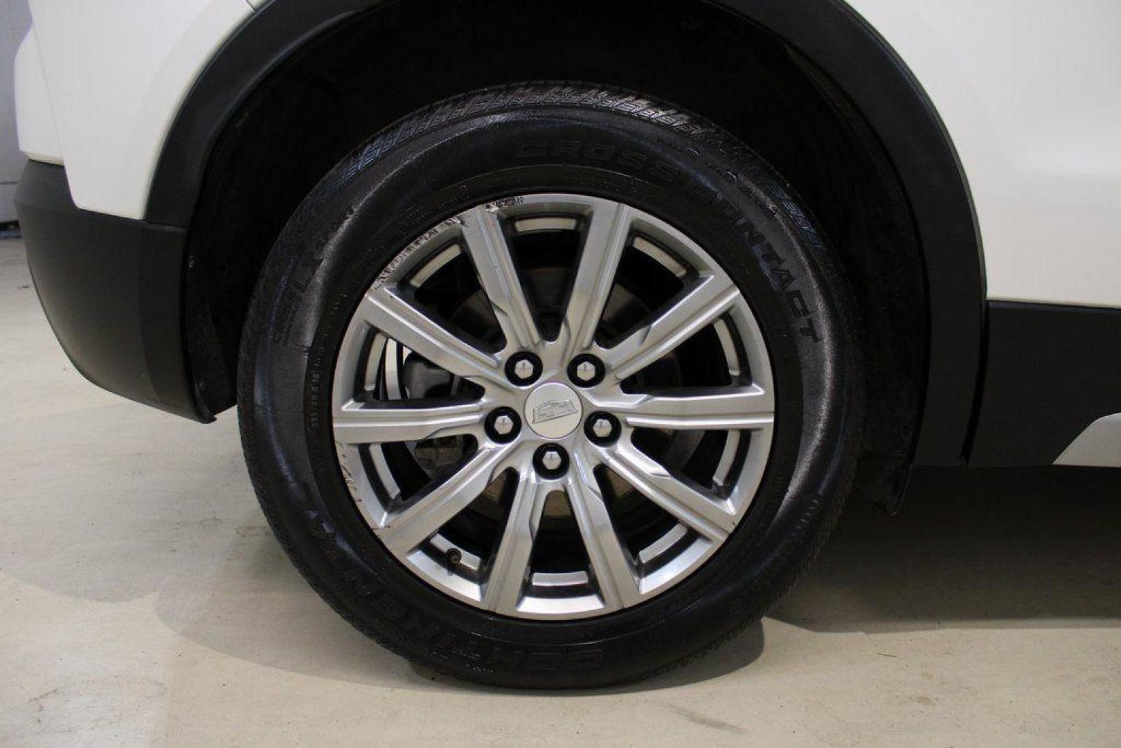 2021 Crystal White Tricoat /Black Cadillac XT4 Premium Luxury (1GYFZCR48MF) with an 2.0L I4 Turbocharged engine, Automatic transmission, located at 15300 Midway Rd., Addison, TX, 75001, (972) 702-0011, 32.958321, -96.838074 - 2021 Cadillac XT4 Premium Luxury<br>Now Available at Midway Auto Group Addison, Texas<br><br>Elevate your everyday drive with the 2021 Cadillac XT4 Premium Luxury a compact luxury SUV that blends bold styling, advanced technology, and premium comfort. With responsive performance and a refined inter - Photo#8