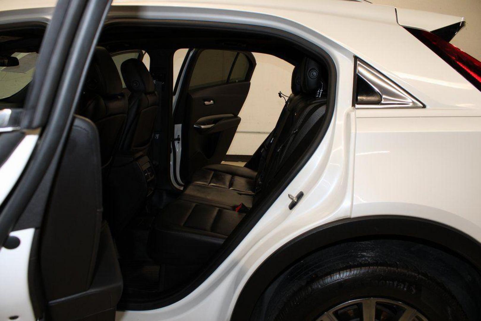 2021 Crystal White Tricoat /Black Cadillac XT4 Premium Luxury (1GYFZCR48MF) with an 2.0L I4 Turbocharged engine, Automatic transmission, located at 15300 Midway Rd., Addison, TX, 75001, (972) 702-0011, 32.958321, -96.838074 - 2021 Cadillac XT4 Premium Luxury<br>Now Available at Midway Auto Group Addison, Texas<br><br>Elevate your everyday drive with the 2021 Cadillac XT4 Premium Luxury a compact luxury SUV that blends bold styling, advanced technology, and premium comfort. With responsive performance and a refined inter - Photo#13