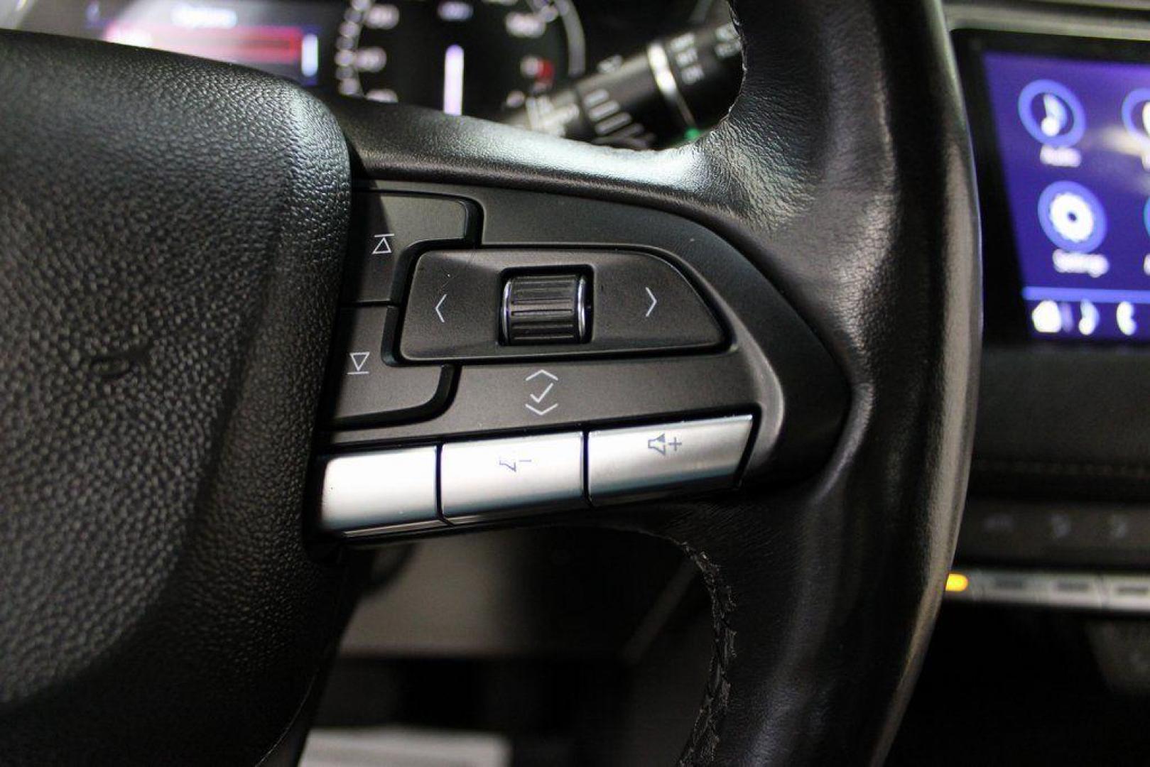 2021 Crystal White Tricoat /Black Cadillac XT4 Premium Luxury (1GYFZCR48MF) with an 2.0L I4 Turbocharged engine, Automatic transmission, located at 15300 Midway Rd., Addison, TX, 75001, (972) 702-0011, 32.958321, -96.838074 - 2021 Cadillac XT4 Premium Luxury<br>Now Available at Midway Auto Group Addison, Texas<br><br>Elevate your everyday drive with the 2021 Cadillac XT4 Premium Luxury a compact luxury SUV that blends bold styling, advanced technology, and premium comfort. With responsive performance and a refined inter - Photo#23