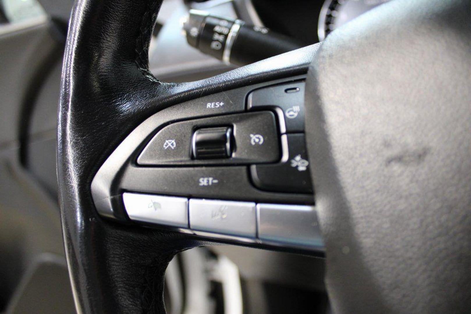 2021 Crystal White Tricoat /Black Cadillac XT4 Premium Luxury (1GYFZCR48MF) with an 2.0L I4 Turbocharged engine, Automatic transmission, located at 15300 Midway Rd., Addison, TX, 75001, (972) 702-0011, 32.958321, -96.838074 - 2021 Cadillac XT4 Premium Luxury<br>Now Available at Midway Auto Group Addison, Texas<br><br>Elevate your everyday drive with the 2021 Cadillac XT4 Premium Luxury a compact luxury SUV that blends bold styling, advanced technology, and premium comfort. With responsive performance and a refined inter - Photo#24