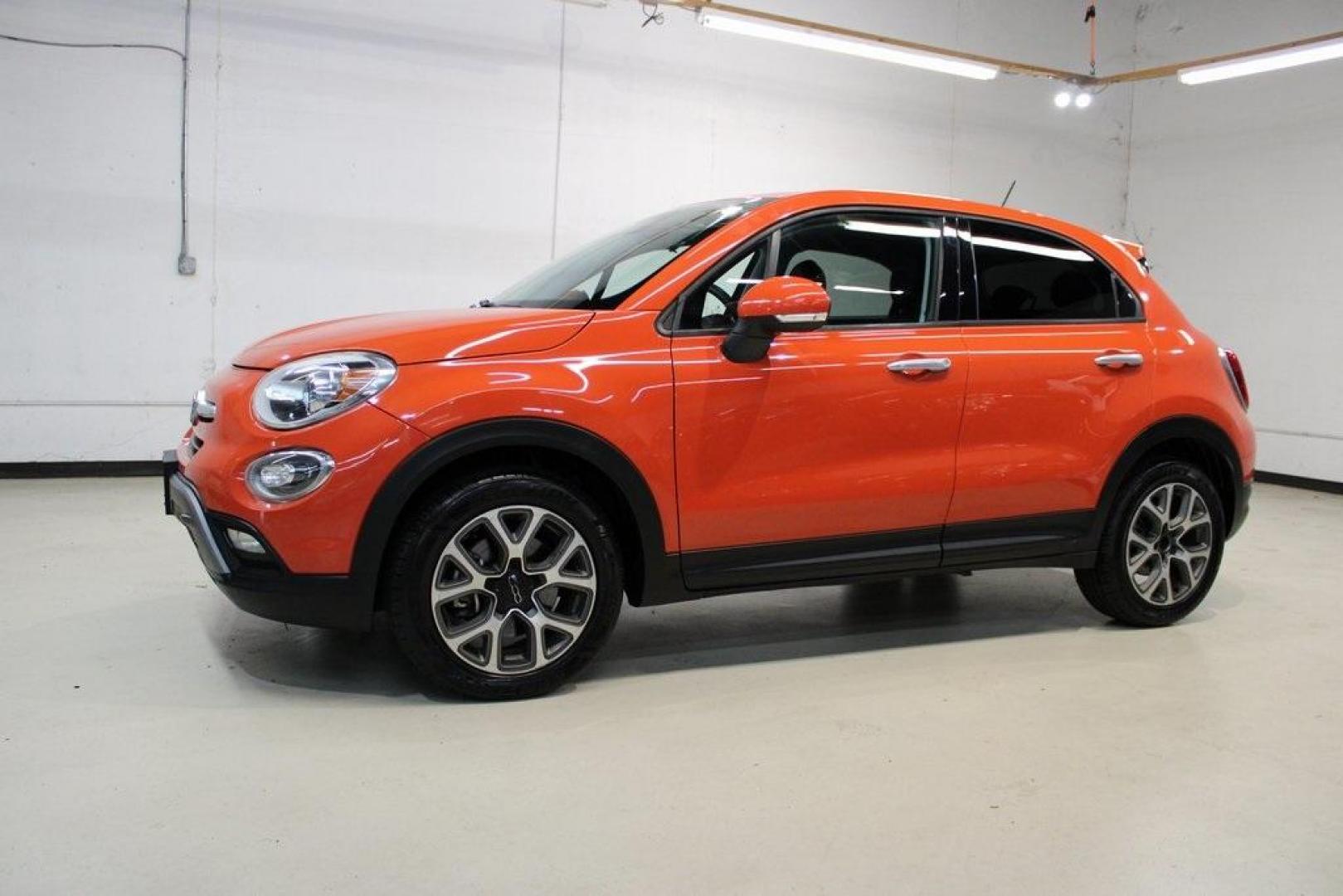 2016 Arancio (Orange) /Black Fiat 500X Trekking (ZFBCFXCT0GP) with an 2.4L I4 MultiAir engine, Automatic transmission, located at 15300 Midway Rd., Addison, TX, 75001, (972) 702-0011, 32.958321, -96.838074 - 2016 FIAT 500X Trekking<br>Now Available at Midway Auto Group Addison, Texas<br><br>Stylish, compact, and loaded with personality the 2016 FIAT 500X Trekking is an urban-friendly crossover with Italian flair and practical versatility. Whether you're navigating narrow city streets or heading out for - Photo#4