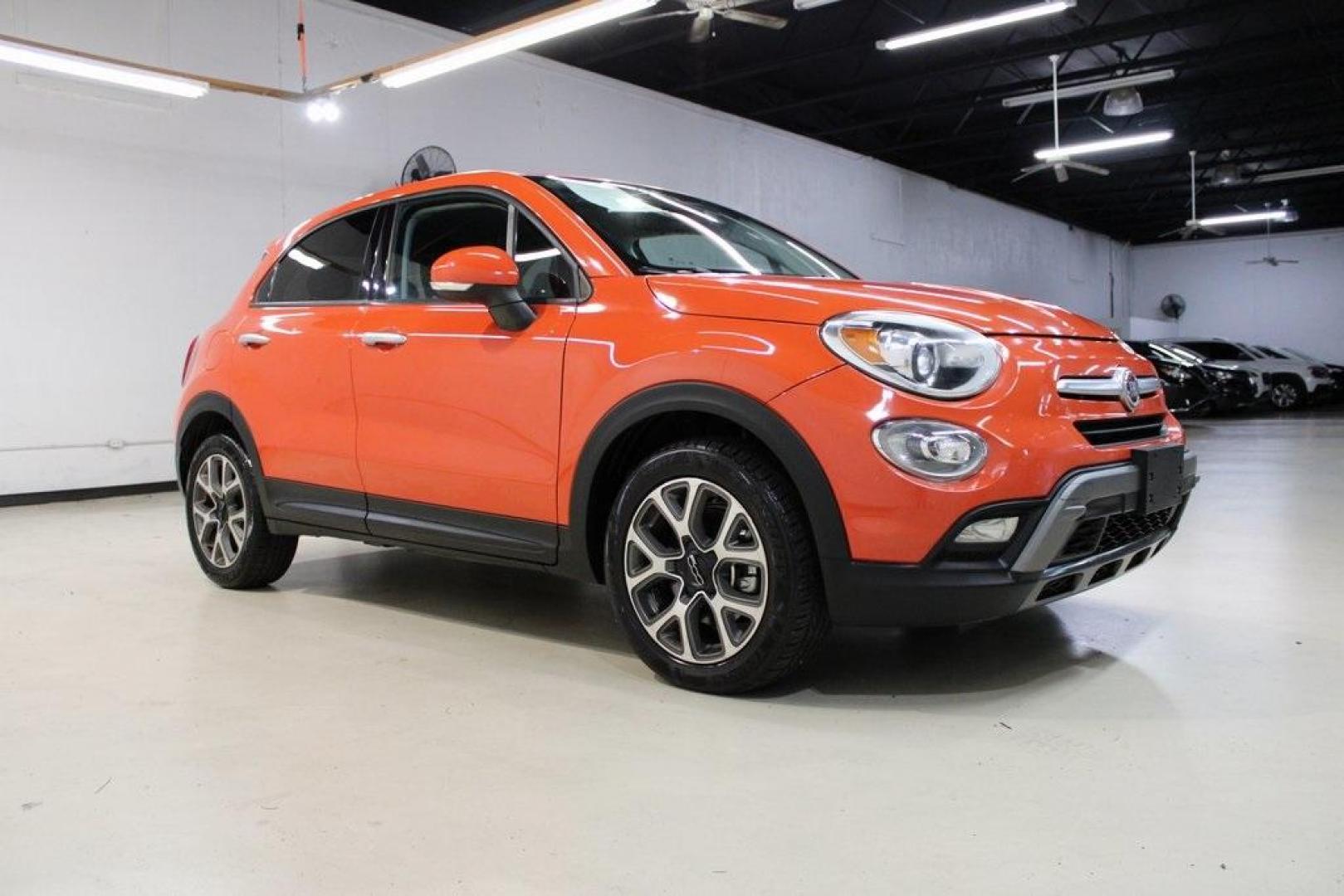 2016 Arancio (Orange) /Black Fiat 500X Trekking (ZFBCFXCT0GP) with an 2.4L I4 MultiAir engine, Automatic transmission, located at 15300 Midway Rd., Addison, TX, 75001, (972) 702-0011, 32.958321, -96.838074 - 2016 FIAT 500X Trekking<br>Now Available at Midway Auto Group Addison, Texas<br><br>Stylish, compact, and loaded with personality the 2016 FIAT 500X Trekking is an urban-friendly crossover with Italian flair and practical versatility. Whether you're navigating narrow city streets or heading out for - Photo#6