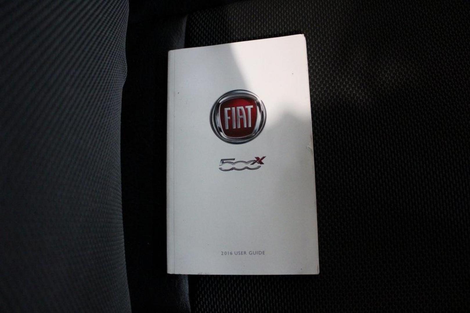 2016 Arancio (Orange) /Black Fiat 500X Trekking (ZFBCFXCT0GP) with an 2.4L I4 MultiAir engine, Automatic transmission, located at 15300 Midway Rd., Addison, TX, 75001, (972) 702-0011, 32.958321, -96.838074 - 2016 FIAT 500X Trekking<br>Now Available at Midway Auto Group Addison, Texas<br><br>Stylish, compact, and loaded with personality the 2016 FIAT 500X Trekking is an urban-friendly crossover with Italian flair and practical versatility. Whether you're navigating narrow city streets or heading out for - Photo#11