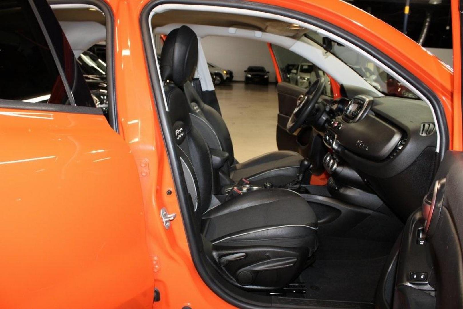 2016 Arancio (Orange) /Black Fiat 500X Trekking (ZFBCFXCT0GP) with an 2.4L I4 MultiAir engine, Automatic transmission, located at 15300 Midway Rd., Addison, TX, 75001, (972) 702-0011, 32.958321, -96.838074 - 2016 FIAT 500X Trekking<br>Now Available at Midway Auto Group Addison, Texas<br><br>Stylish, compact, and loaded with personality the 2016 FIAT 500X Trekking is an urban-friendly crossover with Italian flair and practical versatility. Whether you're navigating narrow city streets or heading out for - Photo#13